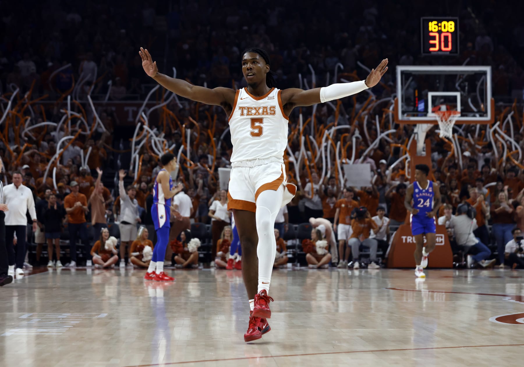 AUSTIN, TX - MARCH 04: Texas Longhorns guard Marcus Carr gets the crowd into the game after making a shot against the Kansas Jayhawks during the game at the Moody Center in Austin, TX on March 04, 2023. (Photo by Adam Davis/Icon Sportswire via Getty Images)