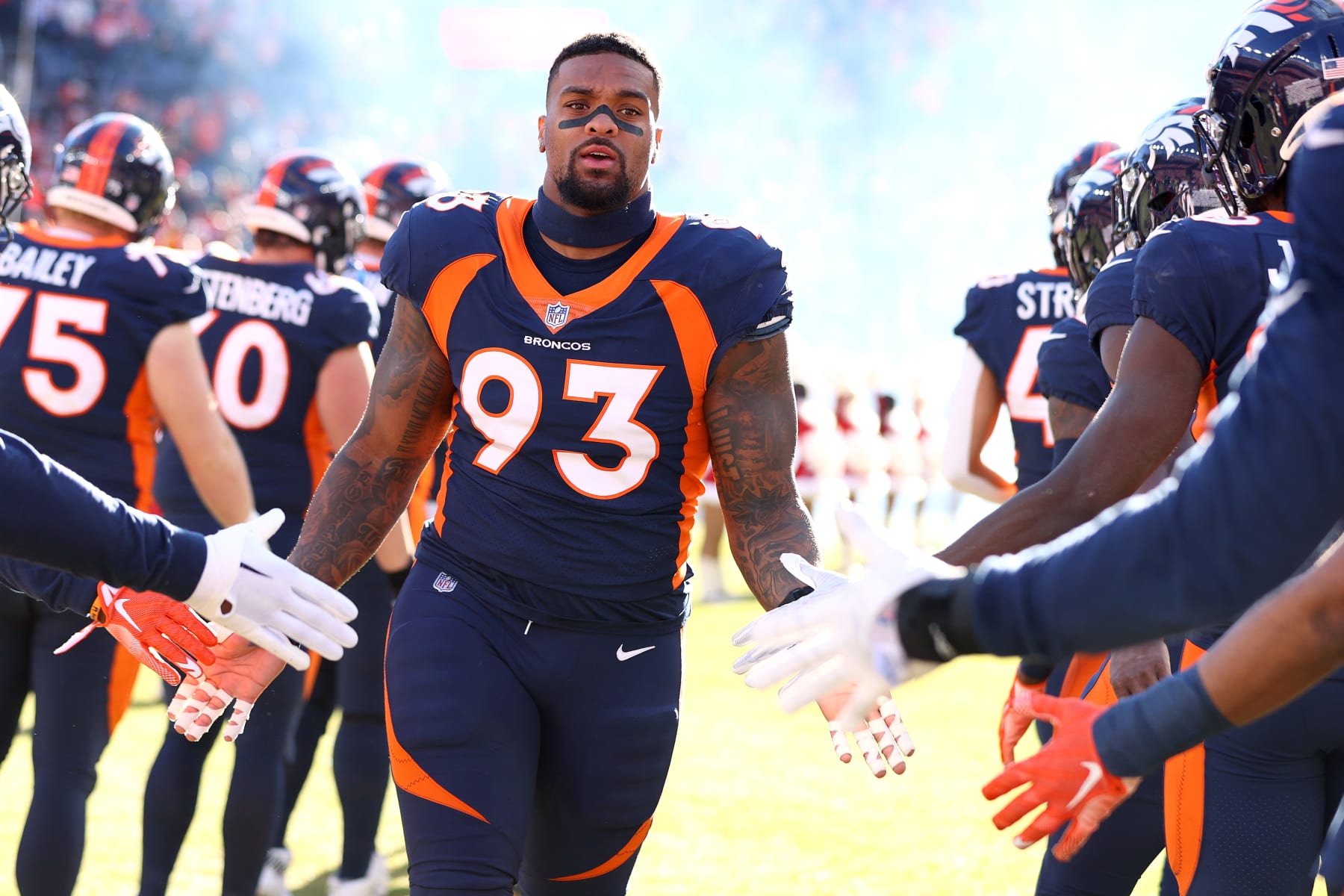DENVER, COLORADO - DECEMBER 11: DreMont Jones #93 of the Denver Broncos takes the field against the Kansas City Chiefs at Empower Field At Mile High on December 11, 2022 in Denver, Colorado. (Photo by Jamie Schwaberow/Getty Images) DENVER, COLORADO - DECEMBER 11: DreMont Jones #93 of the Denver Broncos takes the field against the Kansas City Chiefs at Empower Field At Mile High on December 11, 2022 in Denver, Colorado. (Photo by Jamie Schwaberow/Getty Images)