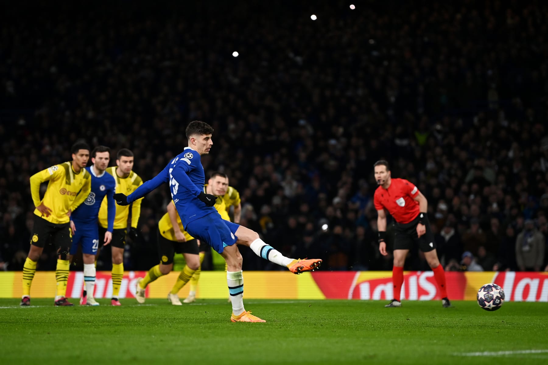 LONDON, ENGLAND - MARCH 07: Kai Havertz of Chelsea scores the team's second goal from their second penalty kick during the UEFA Champions League round of 16 leg two match between Chelsea FC and Borussia Dortmund at Stamford Bridge on March 07, 2023 in London, England. (Photo by Darren Walsh/Chelsea FC via Getty Images)