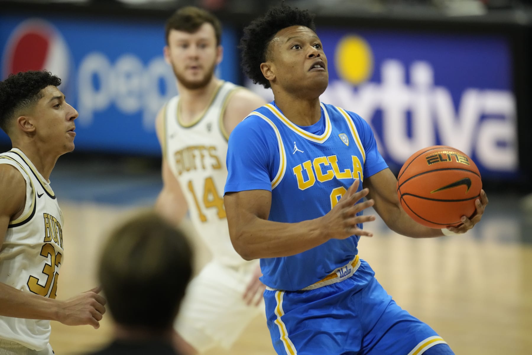 UCLA guard Jaylen Clark (0) in the first half of an NCAA college basketball game Sunday, Feb. 26, 2023, in Denver. (AP Photo/David Zalubowski)