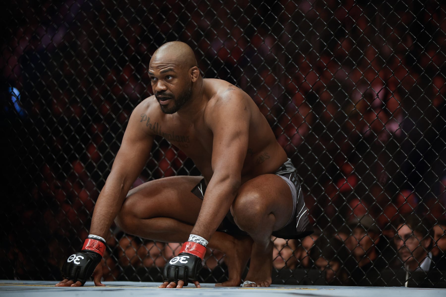 LAS VEGAS, NEVADA - MARCH 04: Jon Jones looks on during the UFC heavyweight championship fight against Ciryl Gane of France during the UFC 285 event at T-Mobile Arena on March 04, 2023 in Las Vegas, Nevada. (Photo by Chris Graythen/Getty Images)