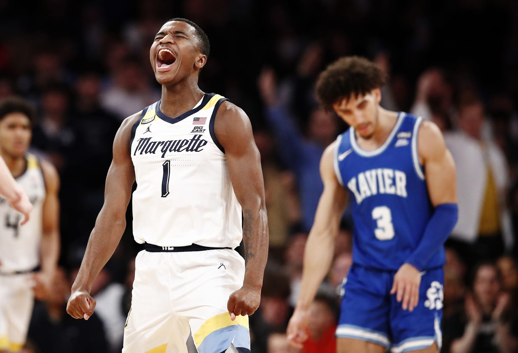 NEW YORK, NEW YORK - MARCH 11: Kam Jones #1 of the Marquette Golden Eagles reacts during the first half against the Xavier Musketeers in the Big East Basketball Tournament Championship at Madison Square Garden on March 11, 2023 in New York City. (Photo by Sarah Stier/Getty Images)