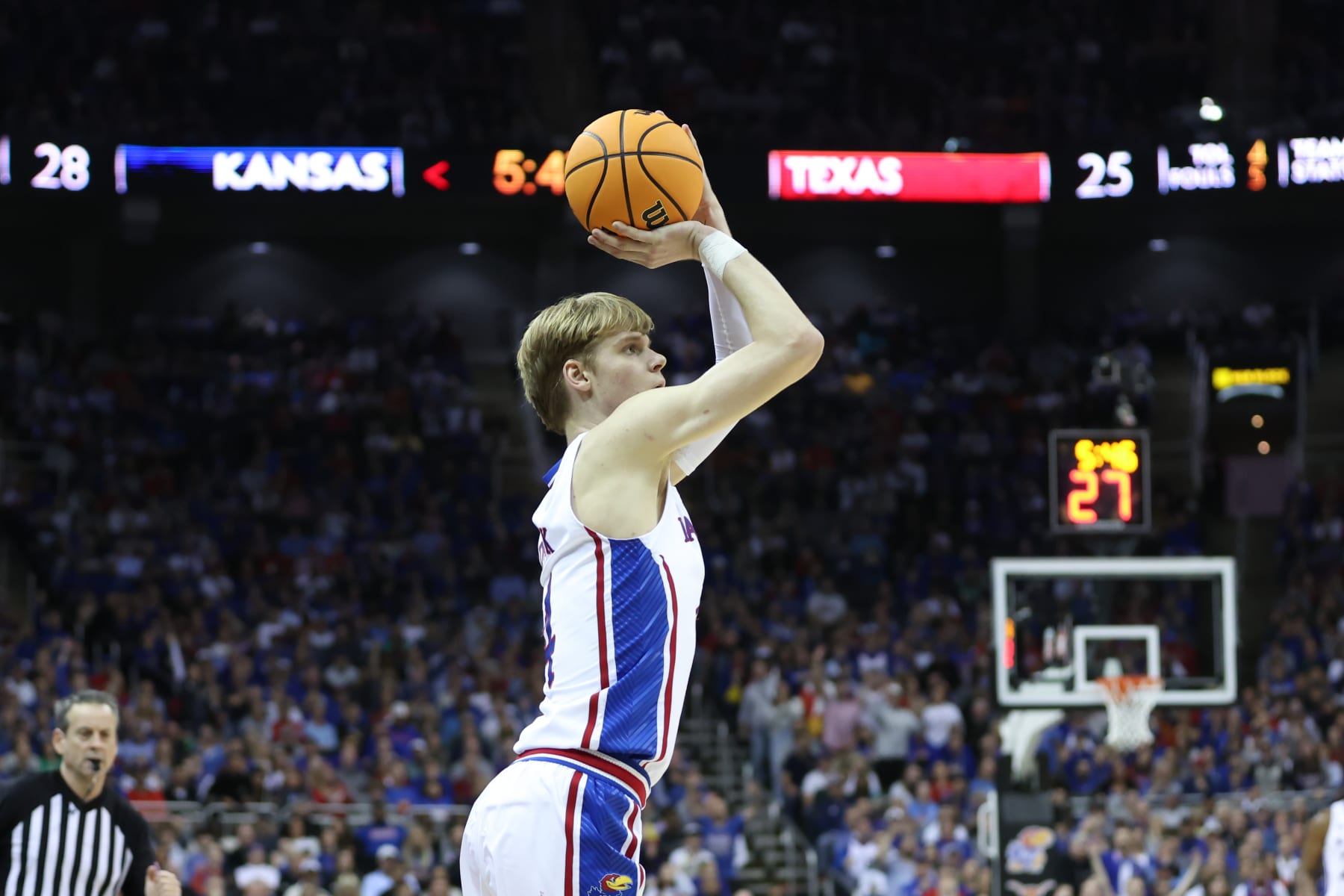 KANSAS CITY, MO - MARCH 11: Kansas Jayhawks guard Gradey Dick (4) shoots a three in the first half of the Big 12 basketball tournament championship game between the Texas Longhorns and Kansas Jayhawks on March 11, 2023 at T-Mobile Center in Kansas City, MO. (Photo by Scott Winters/Icon Sportswire via Getty Images)