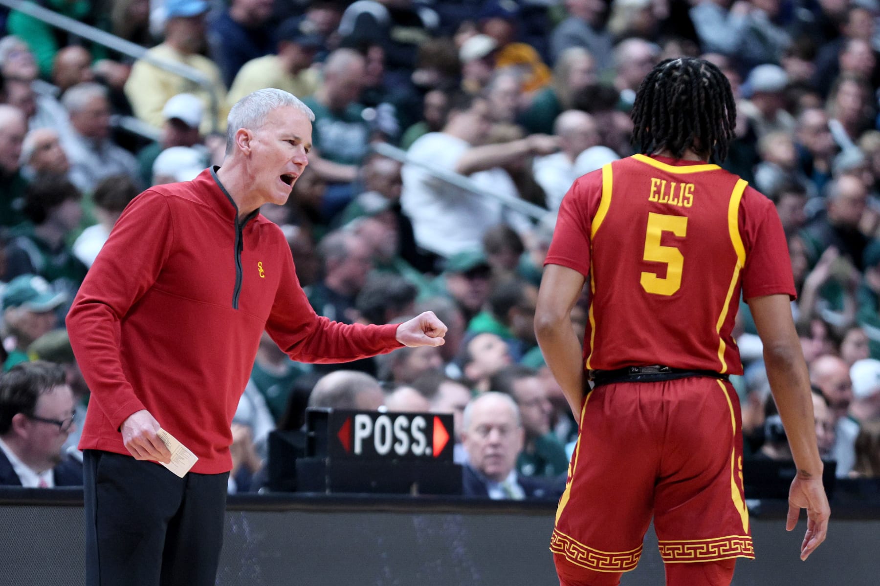 COLUMBUS, OHIO - MARCH 17: Head coach Andy Enfield of the USC Trojans talks with Boogie Ellis #5 against the Michigan State Spartans during the first half in the first round game of the NCAA Men's Basketball Tournament at Nationwide Arena on March 17, 2023 in Columbus, Ohio. (Photo by Andy Lyons/Getty Images)