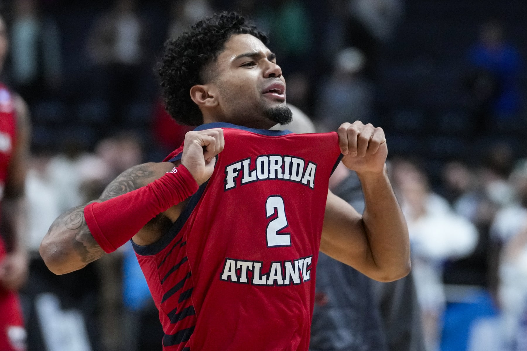 Florida Atlantic guard Nicholas Boyd (2) celebrates after defeating Memphis 66-65 in a first-round college basketball game in the men's NCAA Tournament in Columbus, Ohio, Friday, March 17, 2023. (AP Photo/Michael Conroy)