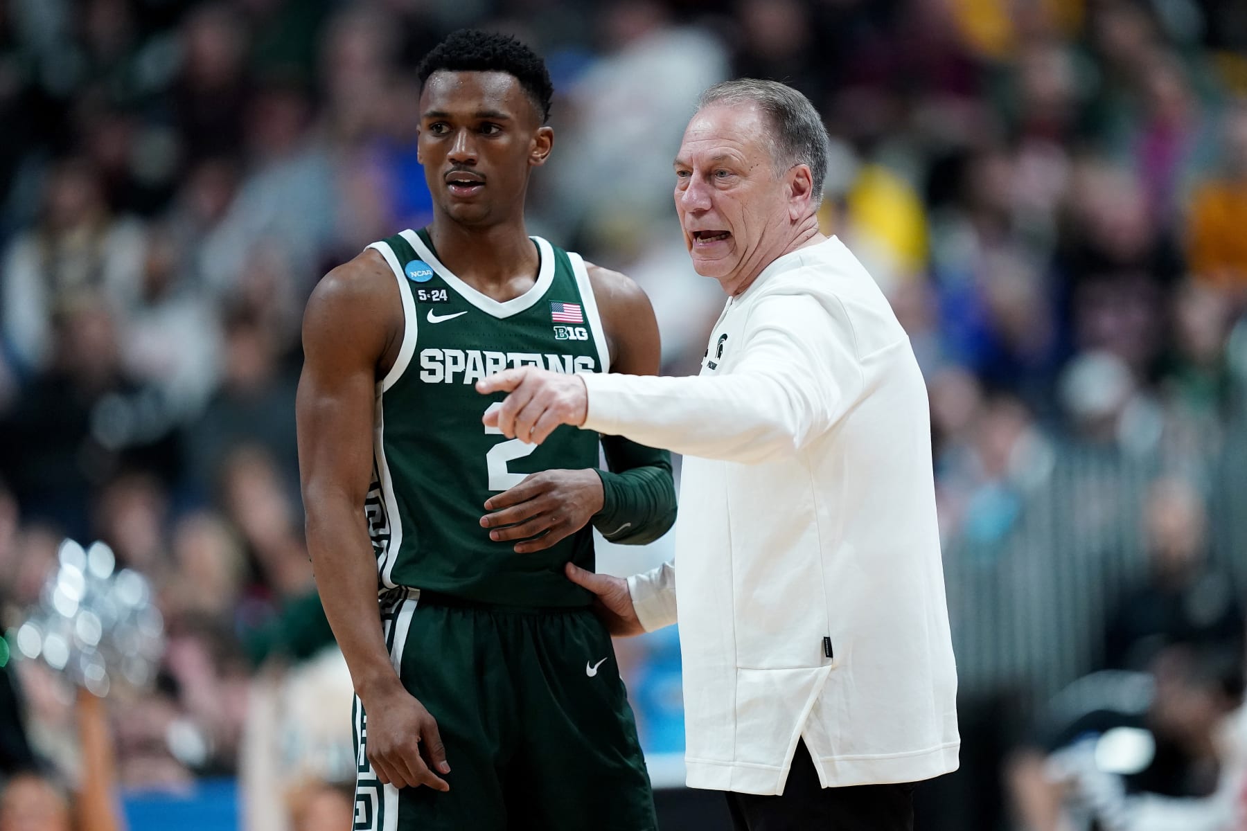 COLUMBUS, OHIO - MARCH 19: Head coach Tom Izzo of the Michigan State Spartans talks with Tyson Walker #2 against the Marquette Golden Eagles during the first half in the second round game of the NCAA Men's Basketball Tournament at Nationwide Arena on March 19, 2023 in Columbus, Ohio. (Photo by Dylan Buell/Getty Images)