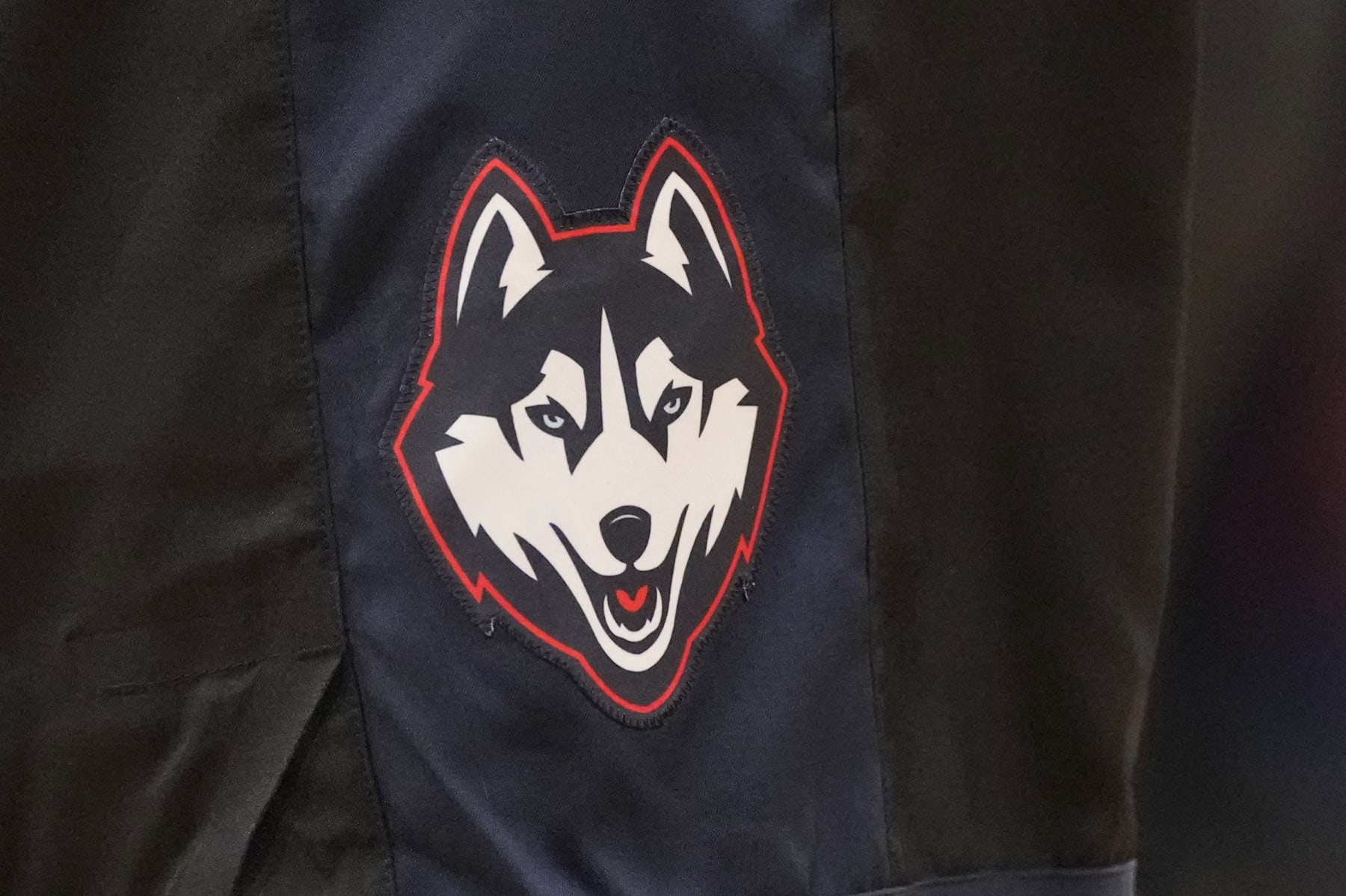 NEW YORK, NEW YORK - MARCH 11:  The Connecticut Huskies logo on pair of short during the Big East Basketball Tournament - Semifinals against the Marquette Golden Eagles at Madison Square Garden on March 11, 2023 in New York City.  (Photo by Mitchell Layton/Getty Images)