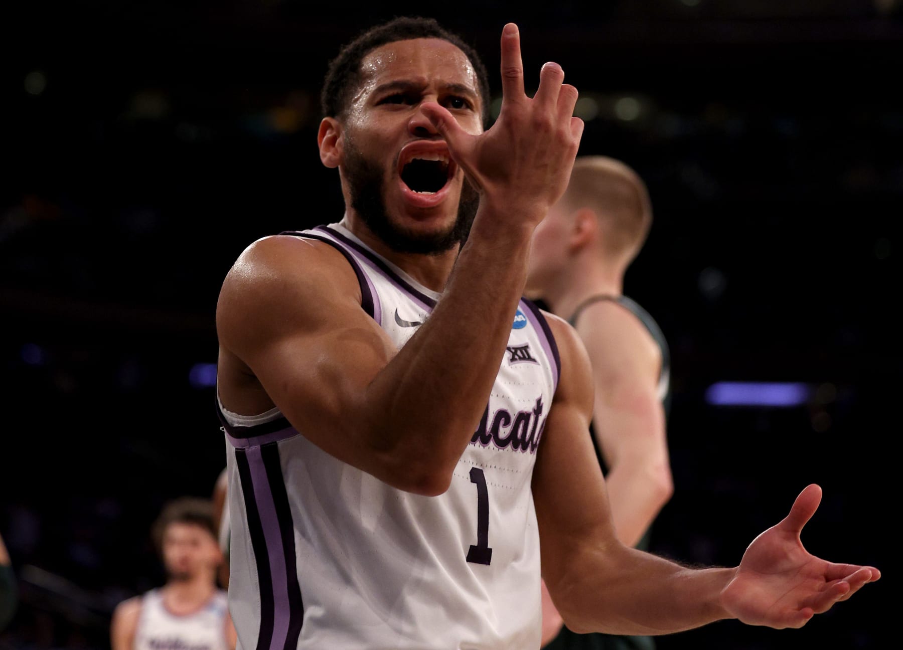 NEW YORK, NEW YORK - MARCH 23: Markquis Nowell #1 of the Kansas State Wildcats celebrates a basket against the Michigan State Spartans during the first half in the Sweet 16 round game of the NCAA Men's Basketball Tournament at Madison Square Garden on March 23, 2023 in New York City. (Photo by Elsa/Getty Images)