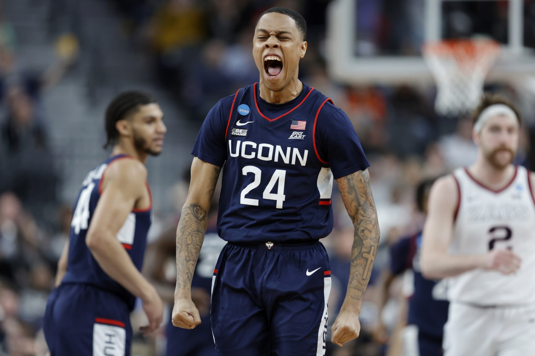 LAS VEGAS, NEVADA - MARCH 25: Jordan Hawkins #24 of the Connecticut Huskies celebrates after making a three point basket during the second half against the Gonzaga Bulldogs in the Elite Eight round of the NCAA Men's Basketball Tournament at T-Mobile Arena on March 25, 2023 in Las Vegas, Nevada. (Photo by Carmen Mandato/Getty Images)