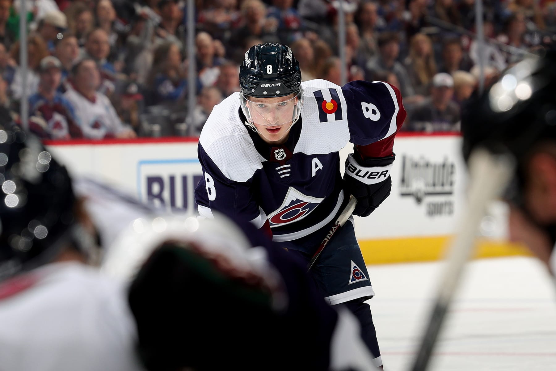 DENVER, COLORADO - MARCH 11: Cale Makar #8 of the Colorado Avalanche awaits a faceoff against the Arizona Coyotes at Ball Arena on March 11, 2023 in Denver, Colorado. (Photo by Michael Martin/NHLI via Getty Images)
