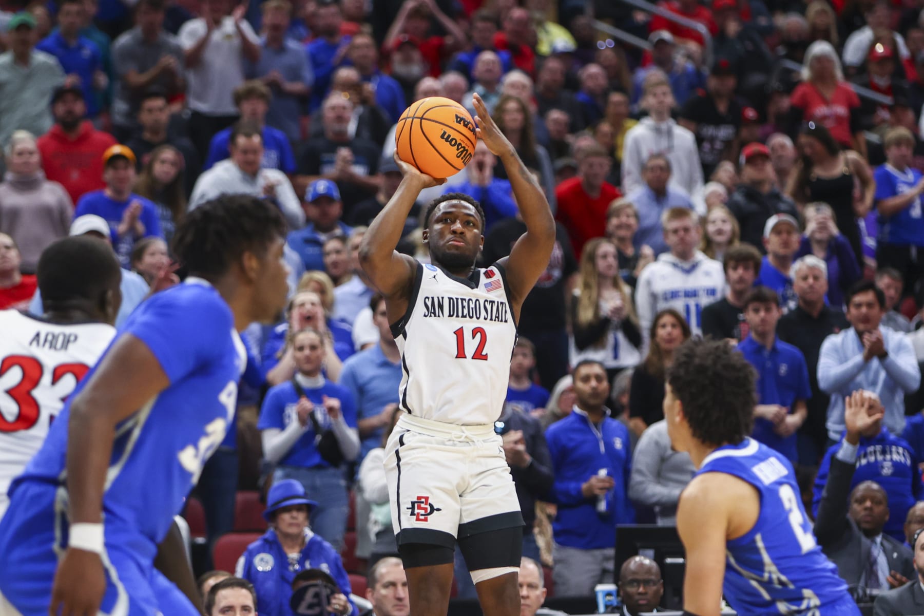 LOUISVILLE, KY - MARCH 26: Darrion Trammell #12 of the San Diego State Aztecs shoots the ball against the Creighton Bluejays during the Elite Eight round of the 2023 NCAA Men's Basketball Tournament held at KFC YUM! Center on March 26, 2023 in Louisville, Kentucky. (Photo by Grace Bradley/NCAA Photos via Getty Images)