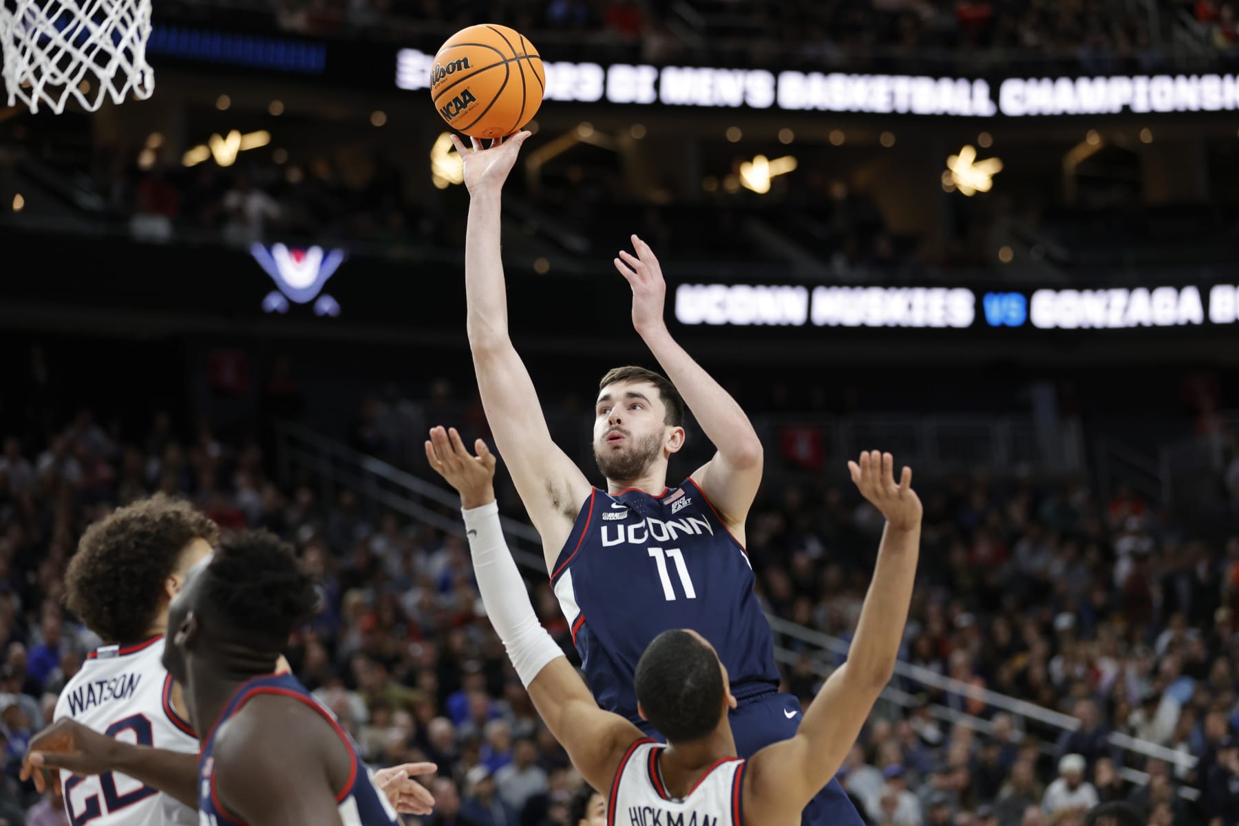 LAS VEGAS, NEVADA - MARCH 25: Alex Karaban #11 of the Connecticut Huskies shoots the ball against Nolan Hickman #11 of the Gonzaga Bulldogs during the first half in the Elite Eight round of the NCAA Men's Basketball Tournament at T-Mobile Arena on March 25, 2023 in Las Vegas, Nevada. (Photo by Carmen Mandato/Getty Images) LAS VEGAS, NEVADA - MARCH 25: Alex Karaban #11 of the Connecticut Huskies shoots the ball against Nolan Hickman #11 of the Gonzaga Bulldogs during the first half in the Elite Eight round of the NCAA Men's Basketball Tournament at T-Mobile Arena on March 25, 2023 in Las Vegas, Nevada. (Photo by Carmen Mandato/Getty Images)