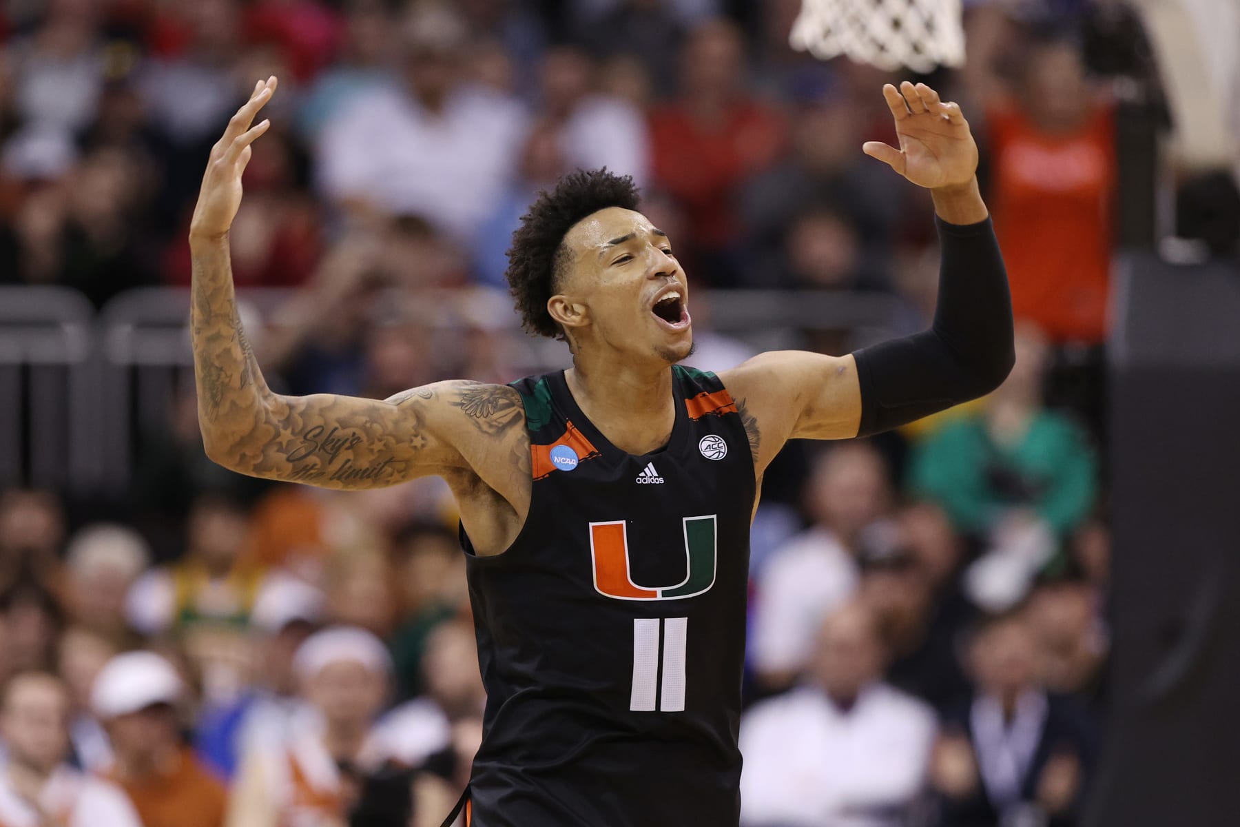 KANSAS CITY, MISSOURI - MARCH 26: Jordan Miller #11 of the Miami Hurricanes celebrates during the second half against the Texas Longhorns in the Elite Eight round of the NCAA Men's Basketball Tournament at T-Mobile Center on March 26, 2023 in Kansas City, Missouri. (Photo by Jamie Squire/Getty Images) KANSAS CITY, MISSOURI - MARCH 26: Jordan Miller #11 of the Miami Hurricanes celebrates during the second half against the Texas Longhorns in the Elite Eight round of the NCAA Men's Basketball Tournament at T-Mobile Center on March 26, 2023 in Kansas City, Missouri. (Photo by Jamie Squire/Getty Images)