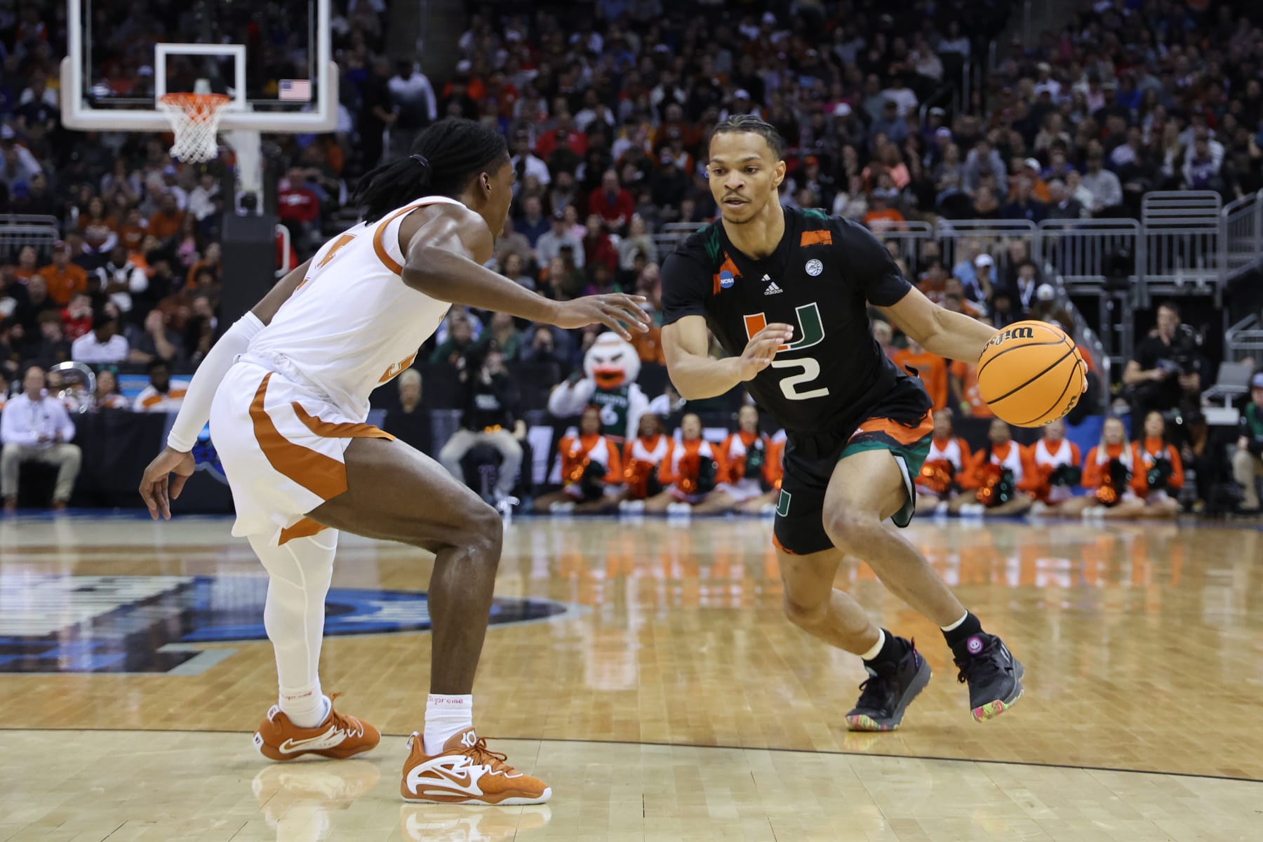 KANSAS CITY, MISSOURI - MARCH 26: Isaiah Wong #2 of the Miami Hurricanes dribbles during the first half against the Texas Longhorns in the Elite Eight round of the NCAA Men's Basketball Tournament at T-Mobile Center on March 26, 2023 in Kansas City, Missouri. (Photo by Gregory Shamus/Getty Images) KANSAS CITY, MISSOURI - MARCH 26: Isaiah Wong #2 of the Miami Hurricanes dribbles during the first half against the Texas Longhorns in the Elite Eight round of the NCAA Men's Basketball Tournament at T-Mobile Center on March 26, 2023 in Kansas City, Missouri. (Photo by Gregory Shamus/Getty Images)