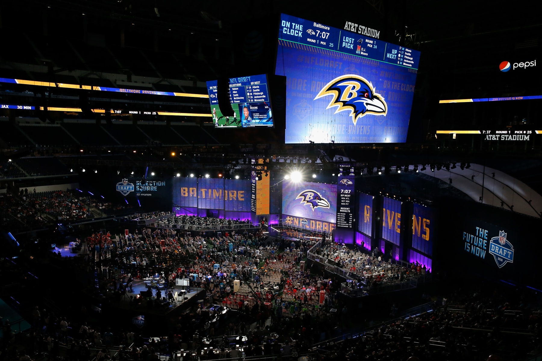 ARLINGTON, TX - APRIL 26: The Baltimore Ravens logo is seen on a video board during the first round of the 2018 NFL Draft at AT&T Stadium on April 26, 2018 in Arlington, Texas. (Photo by Tim Warner/Getty Images) ARLINGTON, TX - APRIL 26: The Baltimore Ravens logo is seen on a video board during the first round of the 2018 NFL Draft at AT&T Stadium on April 26, 2018 in Arlington, Texas. (Photo by Tim Warner/Getty Images)