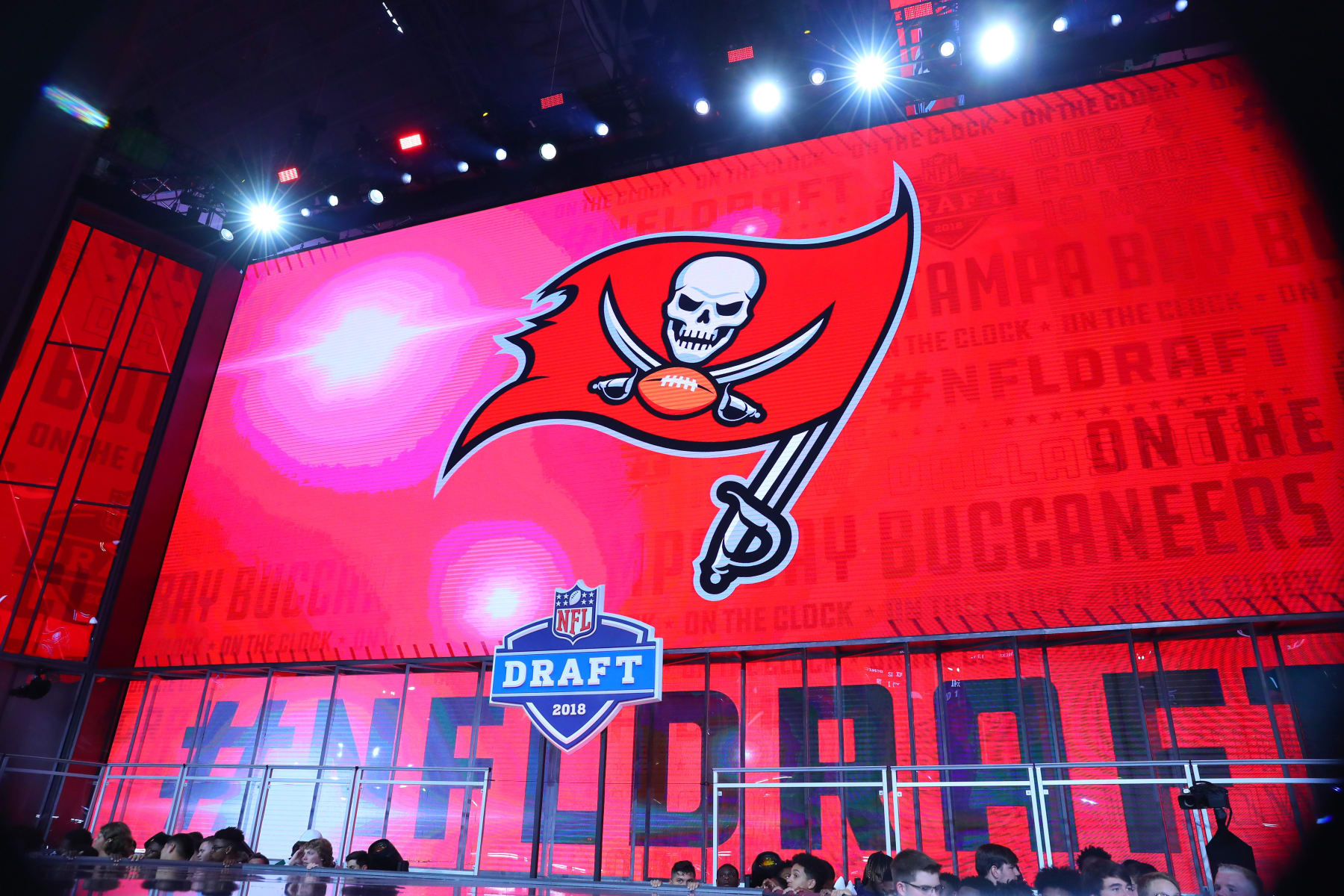 ARLINGTON, TX - APRIL 26: The Tampa Bay Buccaneers logo on the video board during the first round at the 2018 NFL Draft at AT&T Stadium on April 26, 2018 at AT&T Stadium in Arlington Texas. (Photo by Rich Graessle/Icon Sportswire via Getty Images) ARLINGTON, TX - APRIL 26: The Tampa Bay Buccaneers logo on the video board during the first round at the 2018 NFL Draft at AT&T Stadium on April 26, 2018 at AT&T Stadium in Arlington Texas. (Photo by Rich Graessle/Icon Sportswire via Getty Images)