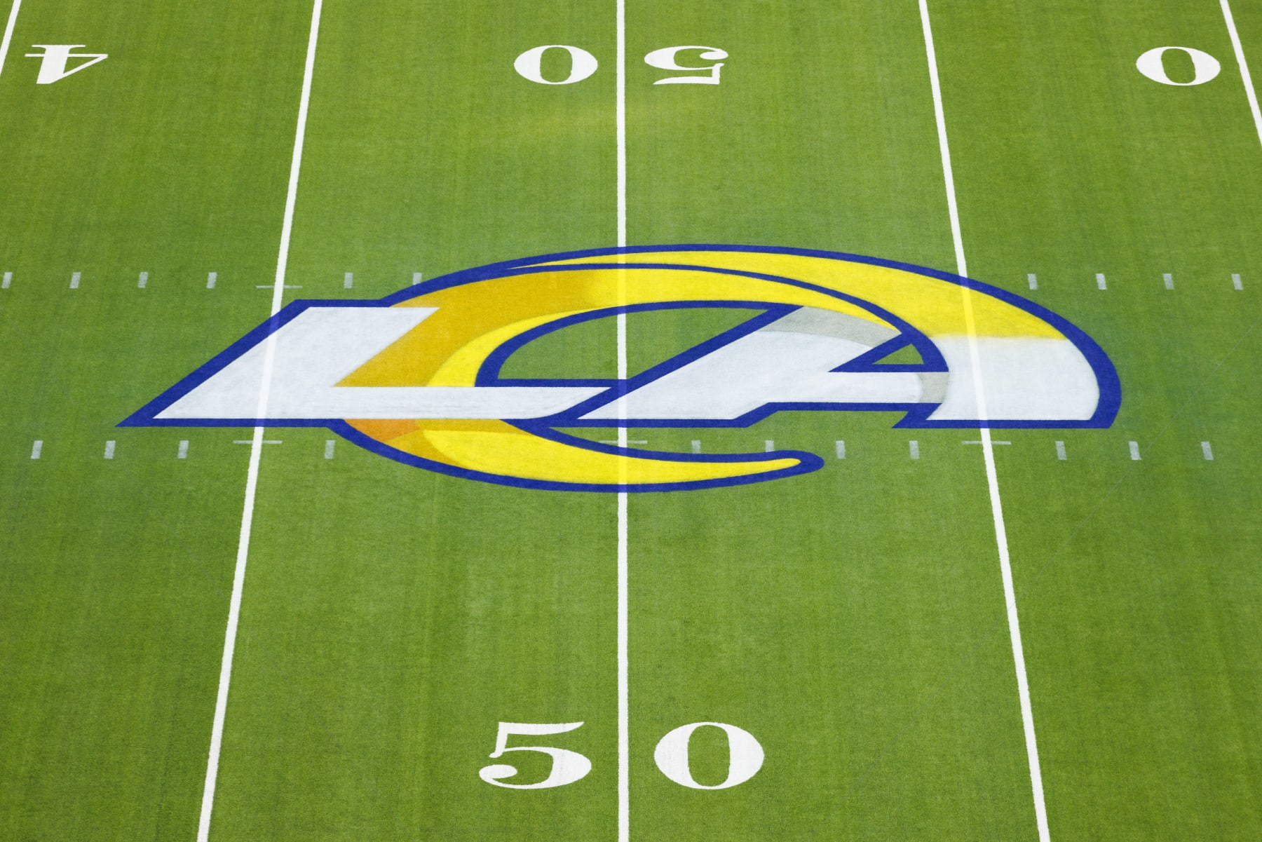 INGLEWOOD, CA - OCTOBER 30: Detail view of Los Angeles Rams logo on the field during an NFL football game between the San Francisco 49ers and the Los Angeles Rams on October 30, 2022 at SoFi Stadium in Inglewood, CA. (Photo by Ric Tapia/Icon Sportswire via Getty Images) INGLEWOOD, CA - OCTOBER 30: Detail view of Los Angeles Rams logo on the field during an NFL football game between the San Francisco 49ers and the Los Angeles Rams on October 30, 2022 at SoFi Stadium in Inglewood, CA. (Photo by Ric Tapia/Icon Sportswire via Getty Images)