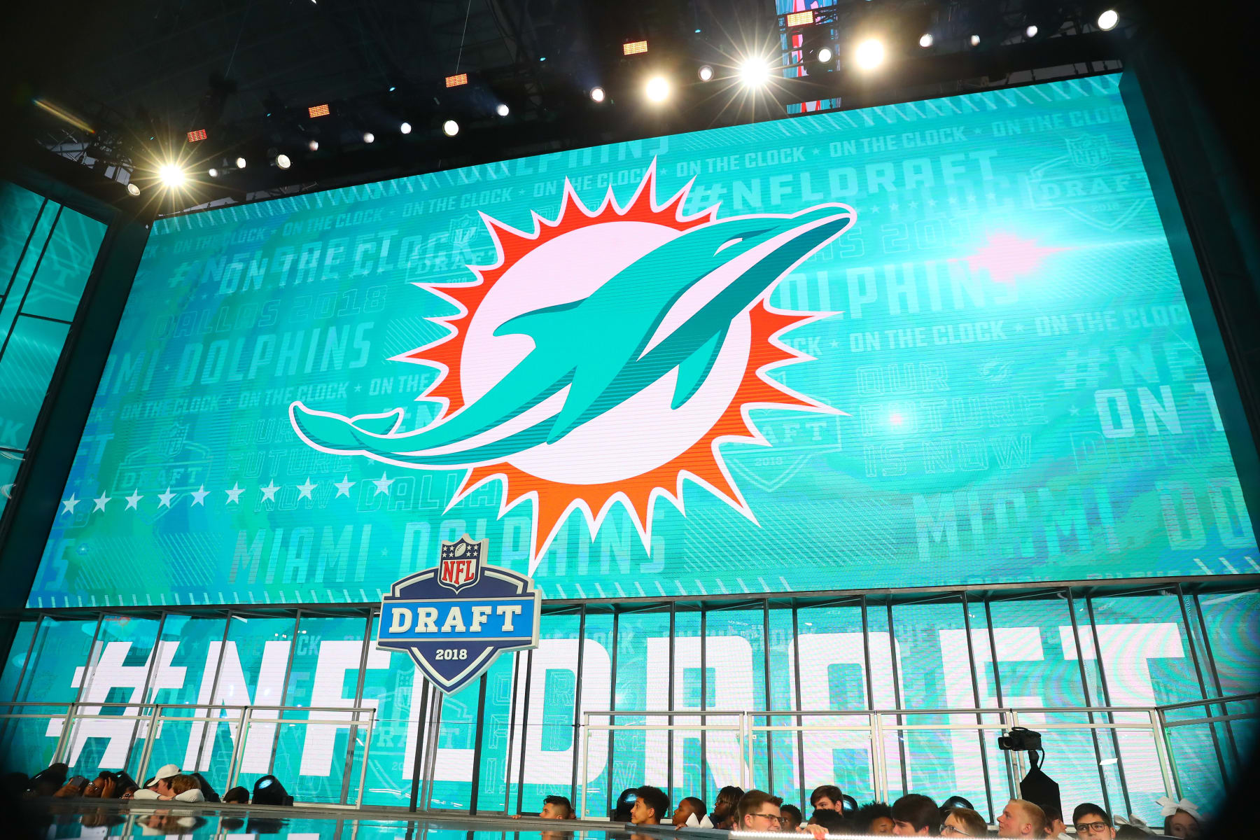 ARLINGTON, TX - APRIL 26: The Miami Dolphins logo on the video board during the first round at the 2018 NFL Draft at AT&T Stadium on April 26, 2018 at AT&T Stadium in Arlington Texas. (Photo by Rich Graessle/Icon Sportswire via Getty Images) ARLINGTON, TX - APRIL 26: The Miami Dolphins logo on the video board during the first round at the 2018 NFL Draft at AT&T Stadium on April 26, 2018 at AT&T Stadium in Arlington Texas. (Photo by Rich Graessle/Icon Sportswire via Getty Images)