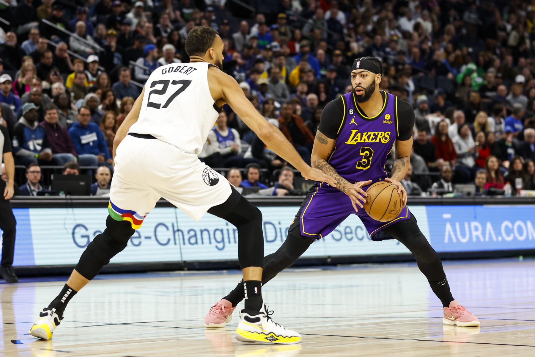 MINNEAPOLIS, MN - MARCH 31: Anthony Davis #3 of the Los Angeles Lakers dribbles the ball while Rudy Gobert #27 of the Minnesota Timberwolves defends in the first quarter of the game at Target Center on March 31, 2023 in Minneapolis, Minnesota. NOTE TO USER: User expressly acknowledges and agrees that, by downloading and or using this Photograph, user is consenting to the terms and conditions of the Getty Images License Agreement. (Photo by David Berding/Getty Images) MINNEAPOLIS, MN - MARCH 31: Anthony Davis #3 of the Los Angeles Lakers dribbles the ball while Rudy Gobert #27 of the Minnesota Timberwolves defends in the first quarter of the game at Target Center on March 31, 2023 in Minneapolis, Minnesota. NOTE TO USER: User expressly acknowledges and agrees that, by downloading and or using this Photograph, user is consenting to the terms and conditions of the Getty Images License Agreement. (Photo by David Berding/Getty Images)