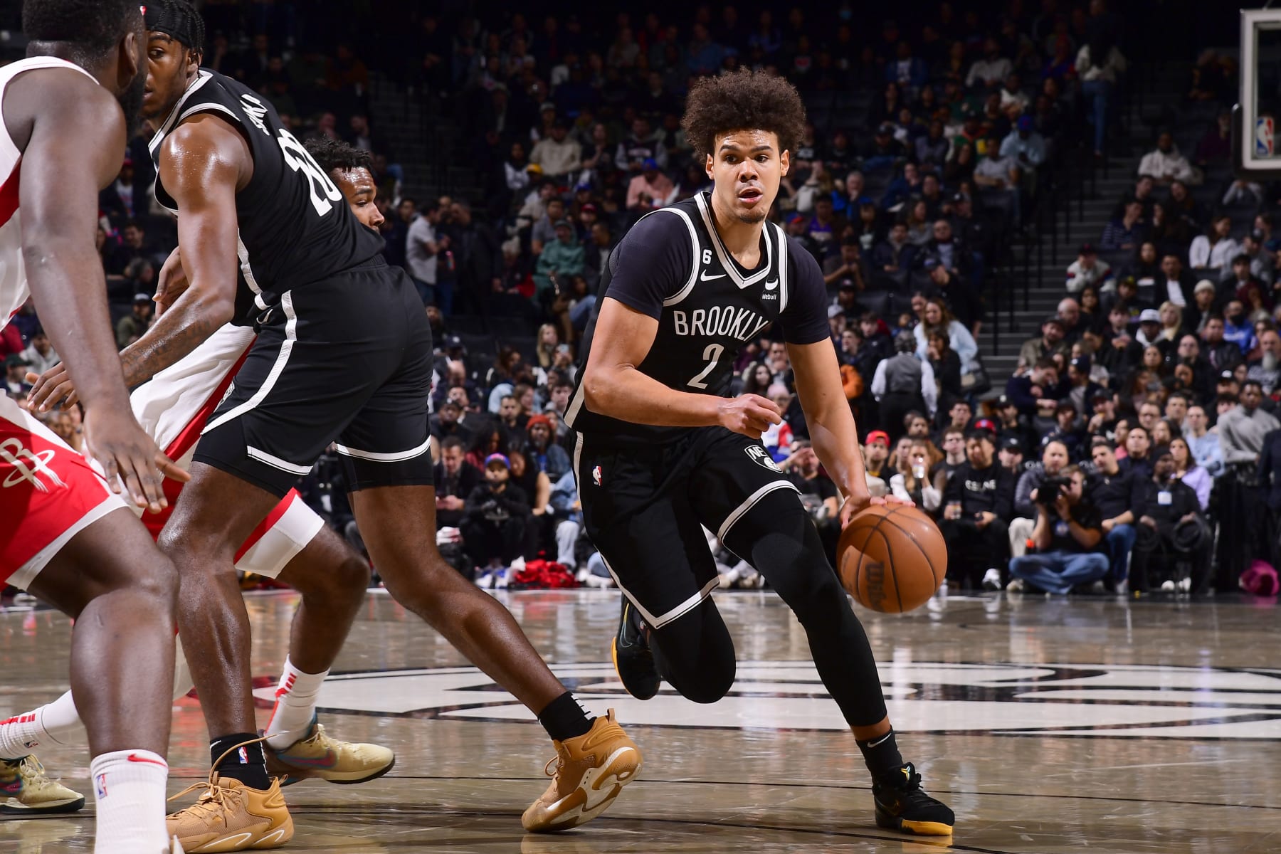 BROOKLYN, NY - MARCH 29: Cameron Johnson #2 of the Brooklyn Nets moves the ball during the game against the Houston Rockets on March 29, 2023 at Barclays Center in Brooklyn, New York. NOTE TO USER: User expressly acknowledges and agrees that, by downloading and or using this Photograph, user is consenting to the terms and conditions of the Getty Images License Agreement. Mandatory Copyright Notice: Copyright 2023 NBAE (Photo by Brian Babineau/NBAE via Getty Images) BROOKLYN, NY - MARCH 29: Cameron Johnson #2 of the Brooklyn Nets moves the ball during the game against the Houston Rockets on March 29, 2023 at Barclays Center in Brooklyn, New York. NOTE TO USER: User expressly acknowledges and agrees that, by downloading and or using this Photograph, user is consenting to the terms and conditions of the Getty Images License Agreement. Mandatory Copyright Notice: Copyright 2023 NBAE (Photo by Brian Babineau/NBAE via Getty Images)