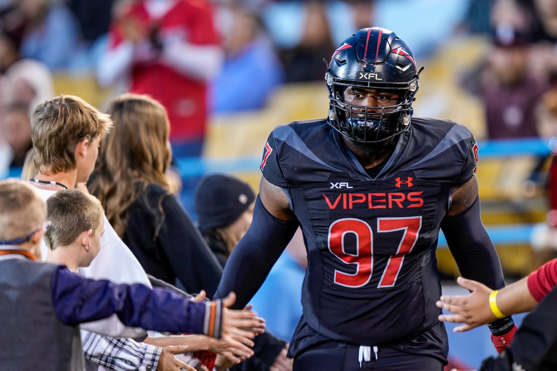 LAS VEGAS, NEVADA - MARCH 18: Defensive lineman LaRon Stokes of the Vegas Vipers is greeted by fans as he enters the field before a game against the Orlando Guardians at Cashman Field on March 18, 2023 in Las Vegas, Nevada. (Photo by Louis Grasse/Getty Images)