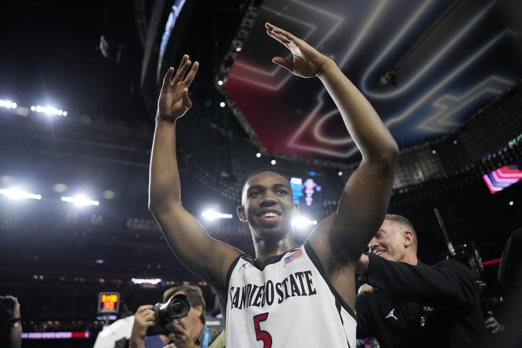 San Diego State guard Lamont Butler celebrates after scoring the game winning basket in a Final Four college basketball game against Florida Atlantic in the NCAA Tournament on Saturday, April 1, 2023, in Houston. (AP Photo/David J. Phillip) San Diego State guard Lamont Butler celebrates after scoring the game winning basket in a Final Four college basketball game against Florida Atlantic in the NCAA Tournament on Saturday, April 1, 2023, in Houston. (AP Photo/David J. Phillip)