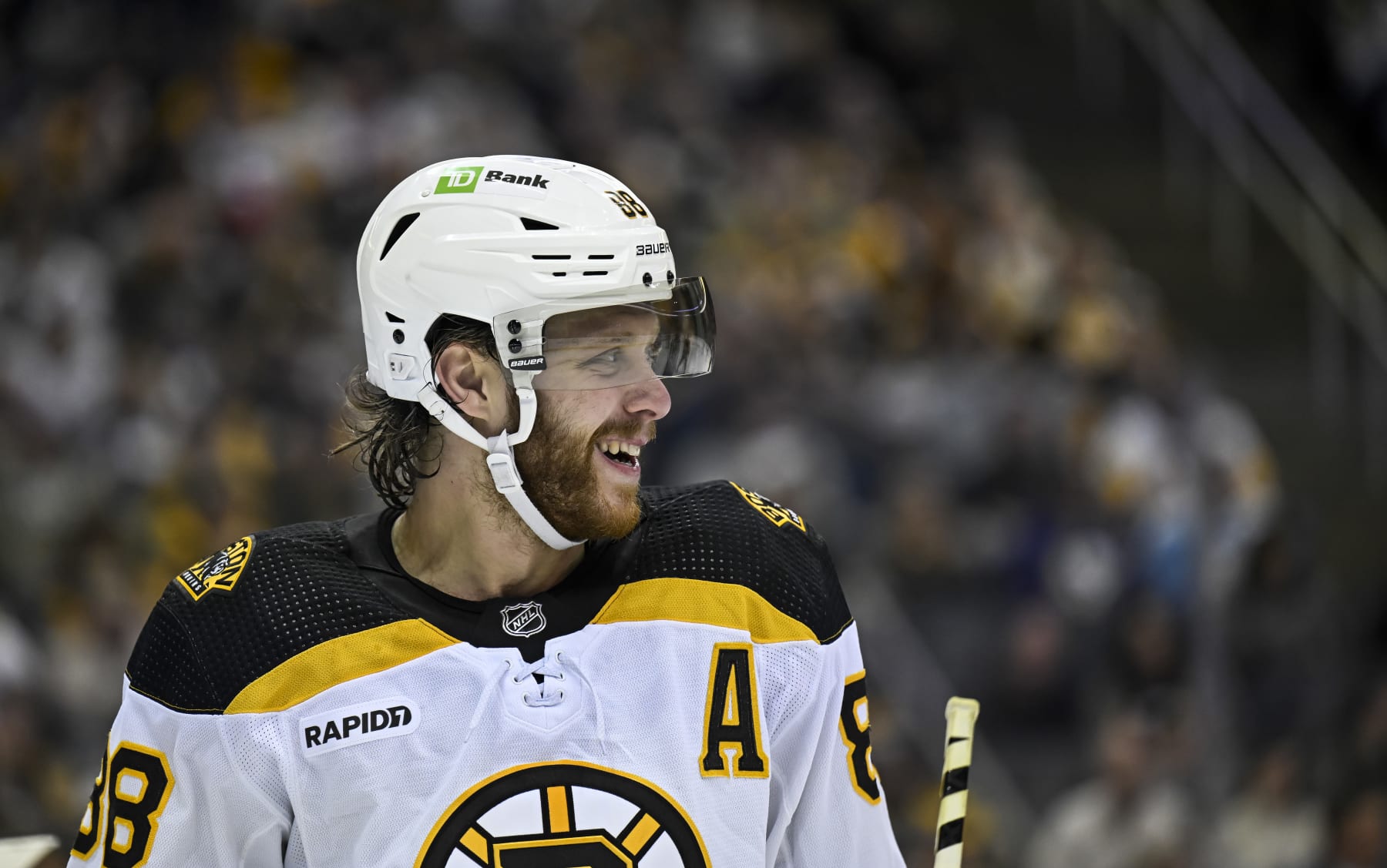PITTSBURGH, PA - APRIL 01: Boston Bruins Right Wing David Pastrnak (88) smiles during the second period in the NHL game between the Pittsburgh Penguins and the Boston Bruins on April 1, 2023, at PPG Paints Arena in Pittsburgh, PA. (Photo by Jeanine Leech/Icon Sportswire via Getty Images)