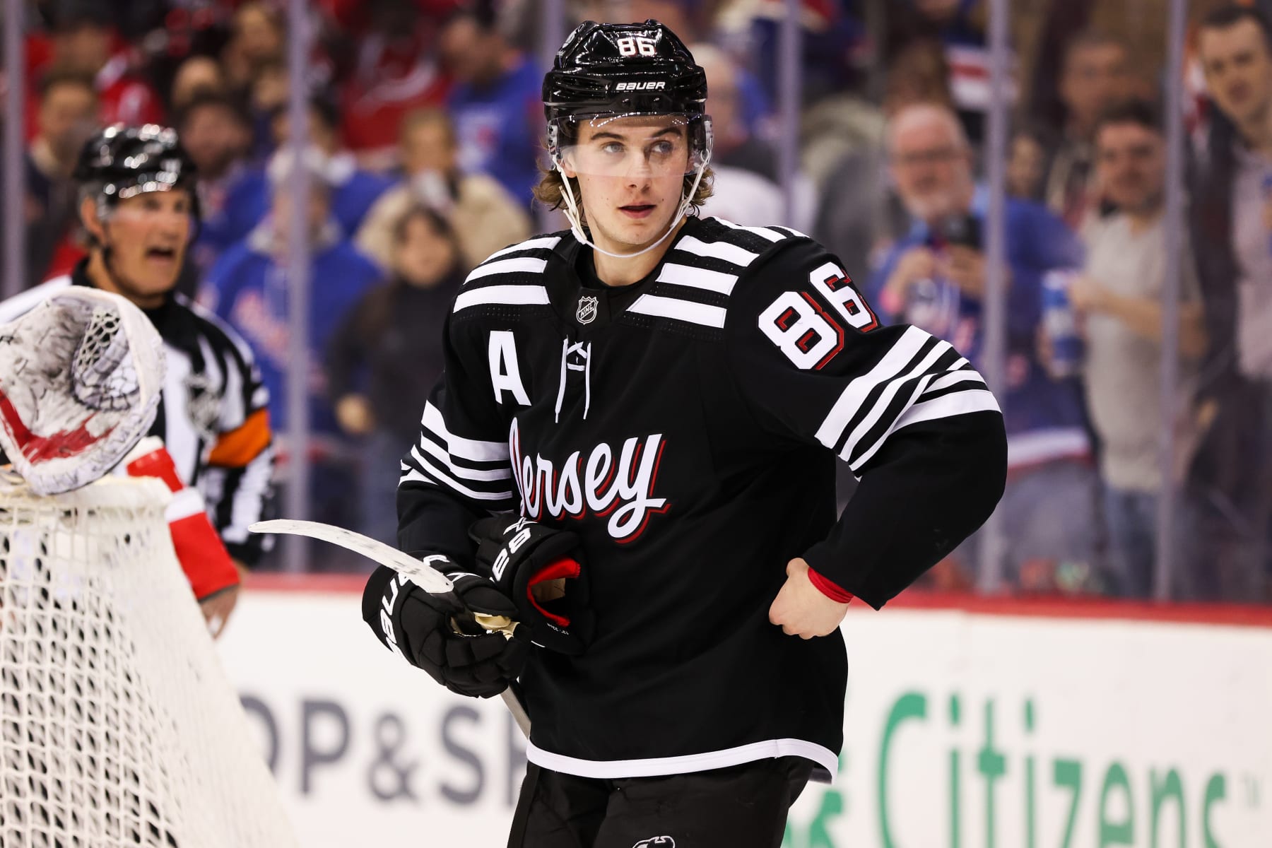 NEWARK, NJ - MARCH 30: New Jersey Devils center Jack Hughes (86) looks on during the National Hockey League game between the New York Rangers and the New Jersey Devils on March 30, 2023 at Prudential Center in Newark, NJ. (Photo by Andrew Mordzynski/Icon Sportswire via Getty Images)