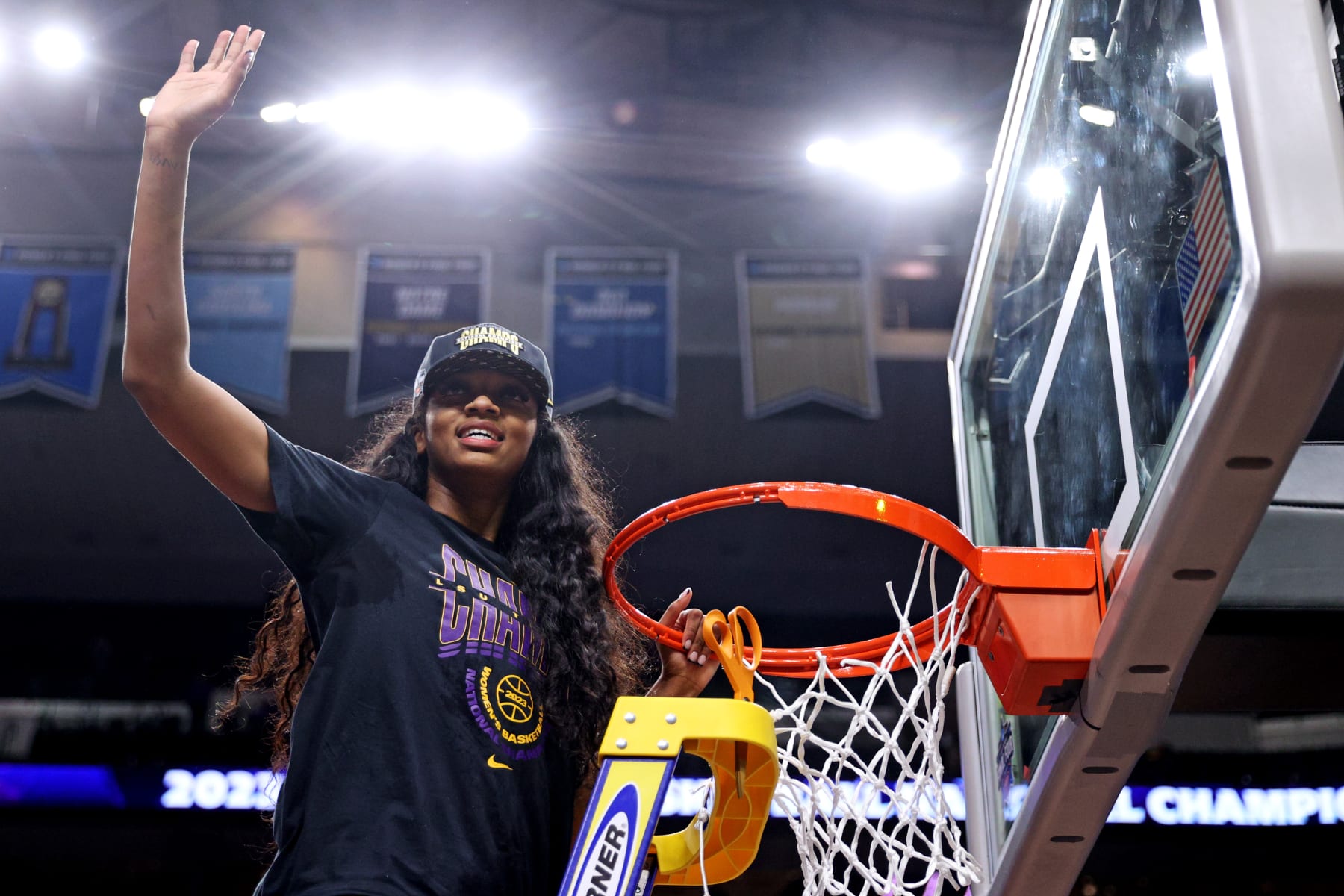 DALLAS, TEXAS - APRIL 02: Angel Reese #10 of the LSU Lady Tigers cuts down a piece of net after defeating the Iowa Hawkeyes 102-85 during the 2023 NCAA Women's Basketball Tournament championship game at American Airlines Center on April 02, 2023 in Dallas, Texas. (Photo by Maddie Meyer/Getty Images)