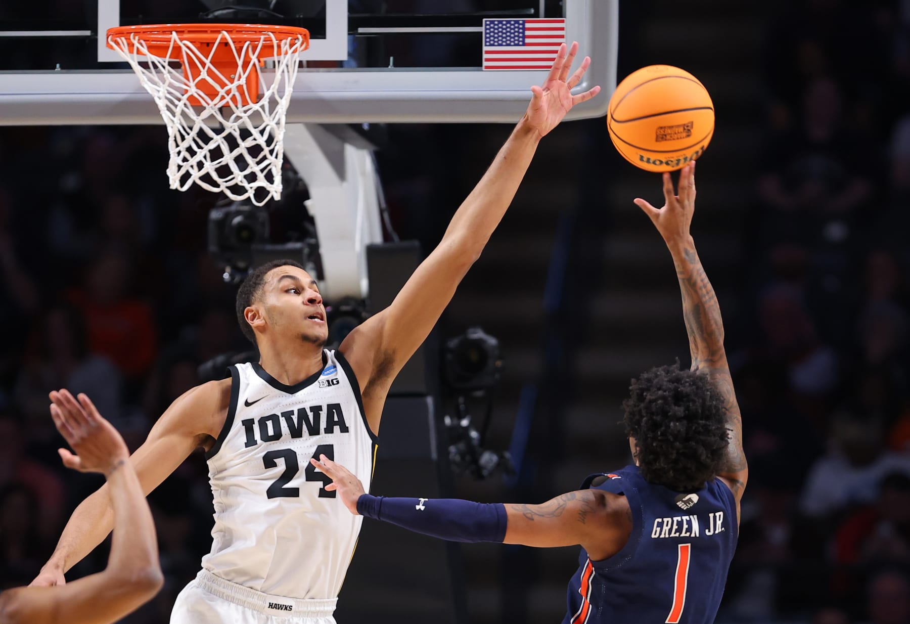 BIRMINGHAM, ALABAMA - MARCH 16: Kris Murray #24 of the Iowa Hawkeyes defends against Wendell Green Jr. #1 of the Auburn Tigers during the first half in the first round of the NCAA Men's Basketball Tournament at Legacy Arena at the BJCC on March 16, 2023 in Birmingham, Alabama. (Photo by Kevin C. Cox/Getty Images)