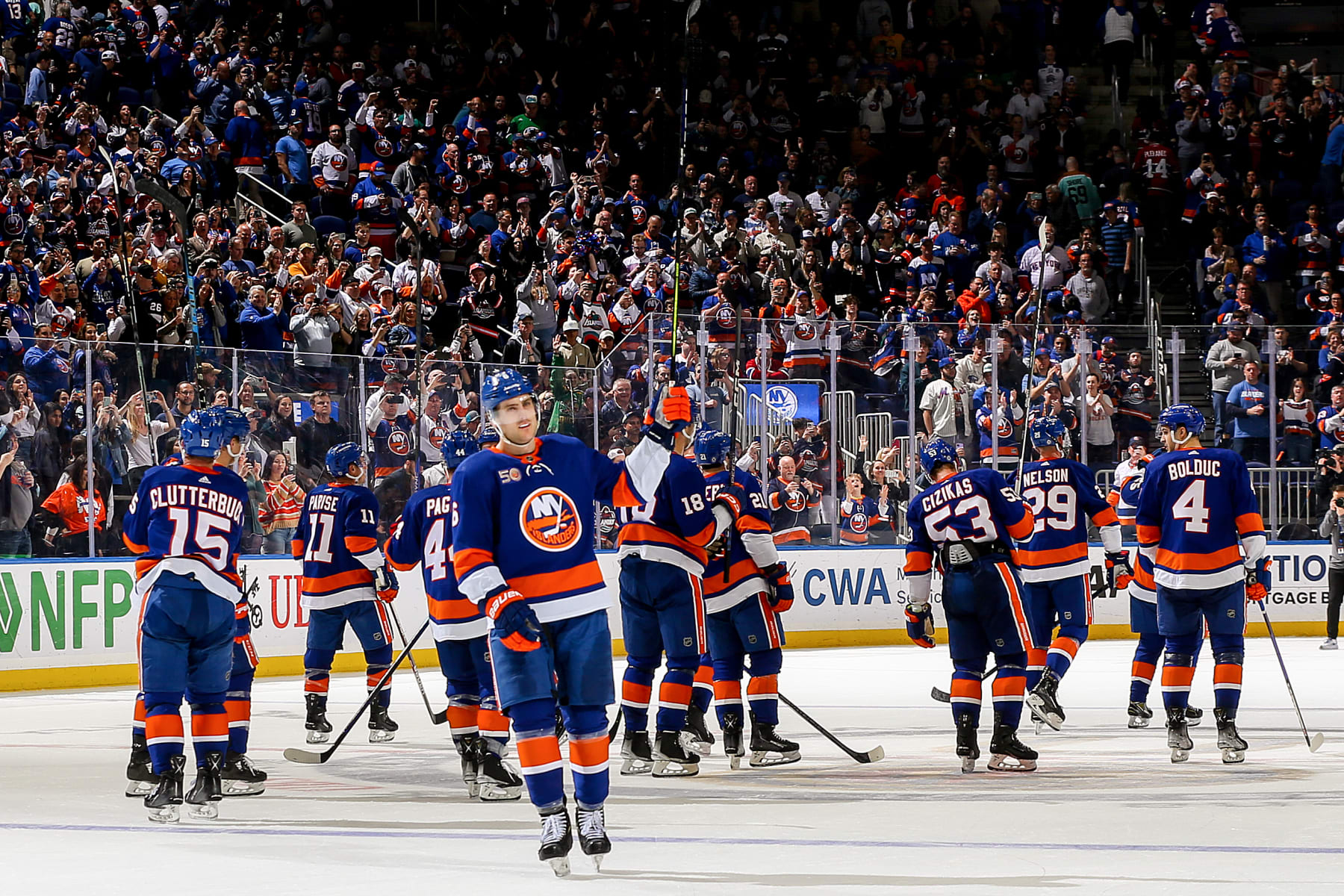 ELMONT, NEW YORK - APRIL 12: The New York Islanders celebrate their 4-2 victory against the Montreal Canadiens to secure a place in the Stanley Cup Playoffs at UBS Arena on April 12, 2023 in Elmont, New York. (Photo by Mike Stobe/NHLI via Getty Images)