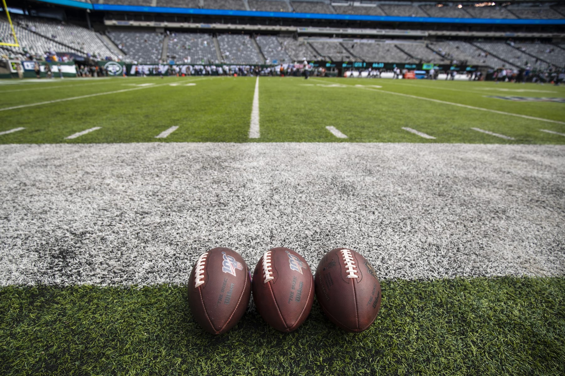 EAST RUTHERFORD, NJ - SEPTEMBER 08: Detail view of three NFL footballs on the sideline before the game between the New York Jets and the Buffalo Bills at MetLife Stadium on September 8, 2019 in East Rutherford, New Jersey. Buffalo defeats New York 17-16. (Photo by Brett Carlsen/Getty Images)