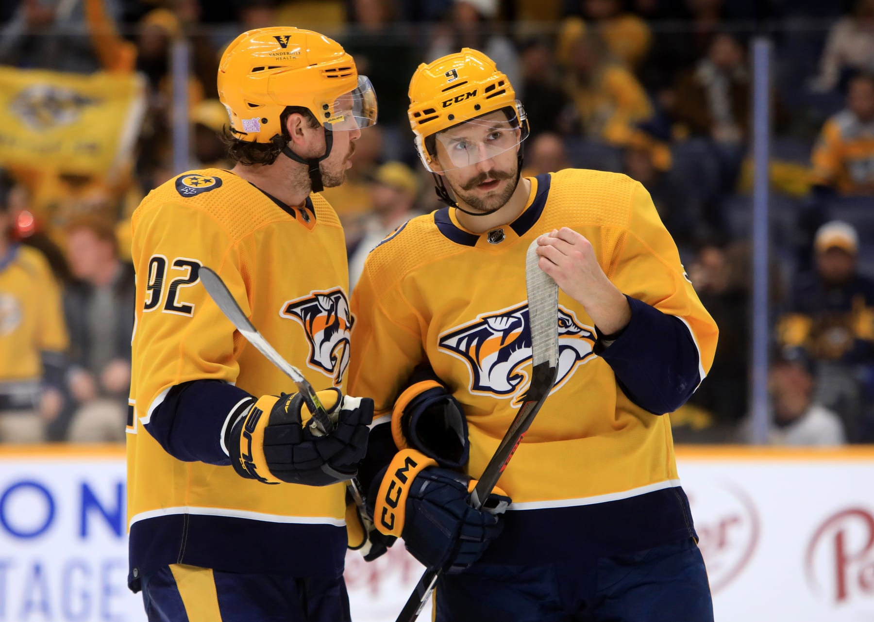 NASHVILLE, TN - NOVEMBER 21: Nashville Predators center Ryan Johansen (92) and left wing Filip Forsberg (9), of Sweden, talk during the NHL game between the Nashville Predators and Arizona Coyotes, held on November 21, 2022, at Bridgestone Arena in Nashville, Tennessee. (Photo by Danny Murphy/Icon Sportswire via Getty Images)
