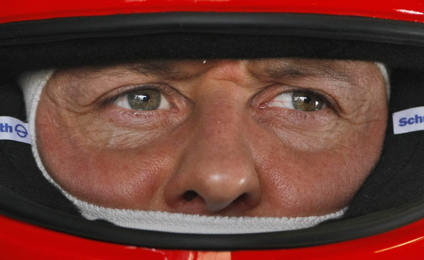 FILE - In this March 12, 2010 file photo Mercedes Grand Prix driver Michael Schumacher of Germany is pictured in the pits during the first practice session at the Formula One Bahrain International Circuit in Sakhir, Bahrain. A Paris newspaper says seven-time Formula One world champion Michael Schumacher is being treated with a cutting-edge stem-cell therapy in one of the French capital's hospitals. (AP Photo/Ben Curtis, File)