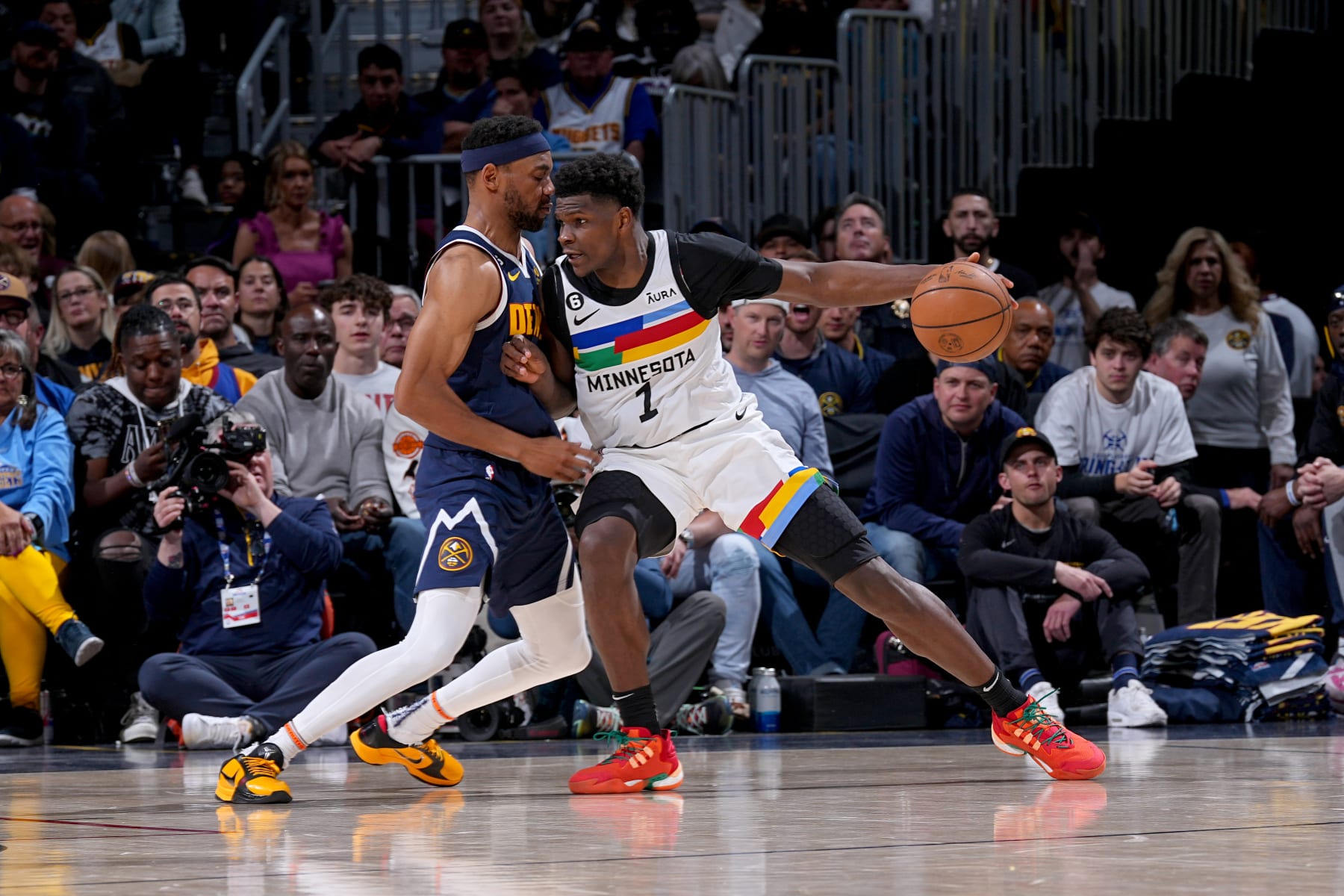 DENVER, CO - APRIL 19: Anthony Edwards #1 of the Minnesota Timberwolves dribbles the ball against the Denver Nuggets during Round One Game Two of the 2023 NBA Playoffs on April 19, 2023 at the Ball Arena in Denver, Colorado. NOTE TO USER: User expressly acknowledges and agrees that, by downloading and/or using this Photograph, user is consenting to the terms and conditions of the Getty Images License Agreement. Mandatory Copyright Notice: Copyright 2023 NBAE (Photo by Bart Young/NBAE via Getty Images) DENVER, CO - APRIL 19: Anthony Edwards #1 of the Minnesota Timberwolves dribbles the ball against the Denver Nuggets during Round One Game Two of the 2023 NBA Playoffs on April 19, 2023 at the Ball Arena in Denver, Colorado. NOTE TO USER: User expressly acknowledges and agrees that, by downloading and/or using this Photograph, user is consenting to the terms and conditions of the Getty Images License Agreement. Mandatory Copyright Notice: Copyright 2023 NBAE (Photo by Bart Young/NBAE via Getty Images)