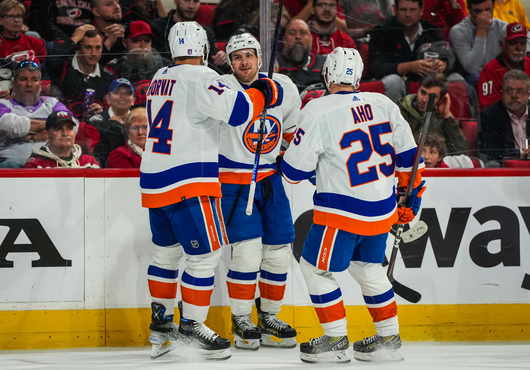 RALEIGH, NORTH CAROLINA - APRIL 25: Mathew Barzal #13 of the New York Islanders celebrates with teammates after a goal during the second period against the Carolina Hurricanes in Game Five of the First Round of the 2023 Stanley Cup Playoffs at PNC Arena on April 25, 2023 in Raleigh, North Carolina. (Photo by Josh Lavallee/NHLI via Getty Images)