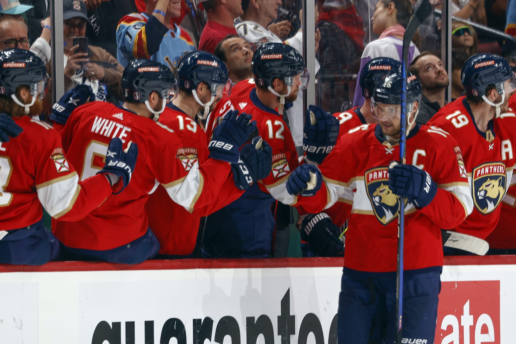 SUNRISE, FL - APRIL 28: Teammates congratulate Aleksander Barkov #16 of the Florida Panthers after he scored a second period goal against the Boston Bruins in Game Six of the First Round of the 2023 Stanley Cup Playoffs at the FLA Live Arena on April 28, 2023 in Sunrise, Florida. (Photo by Joel Auerbach/Getty Images)