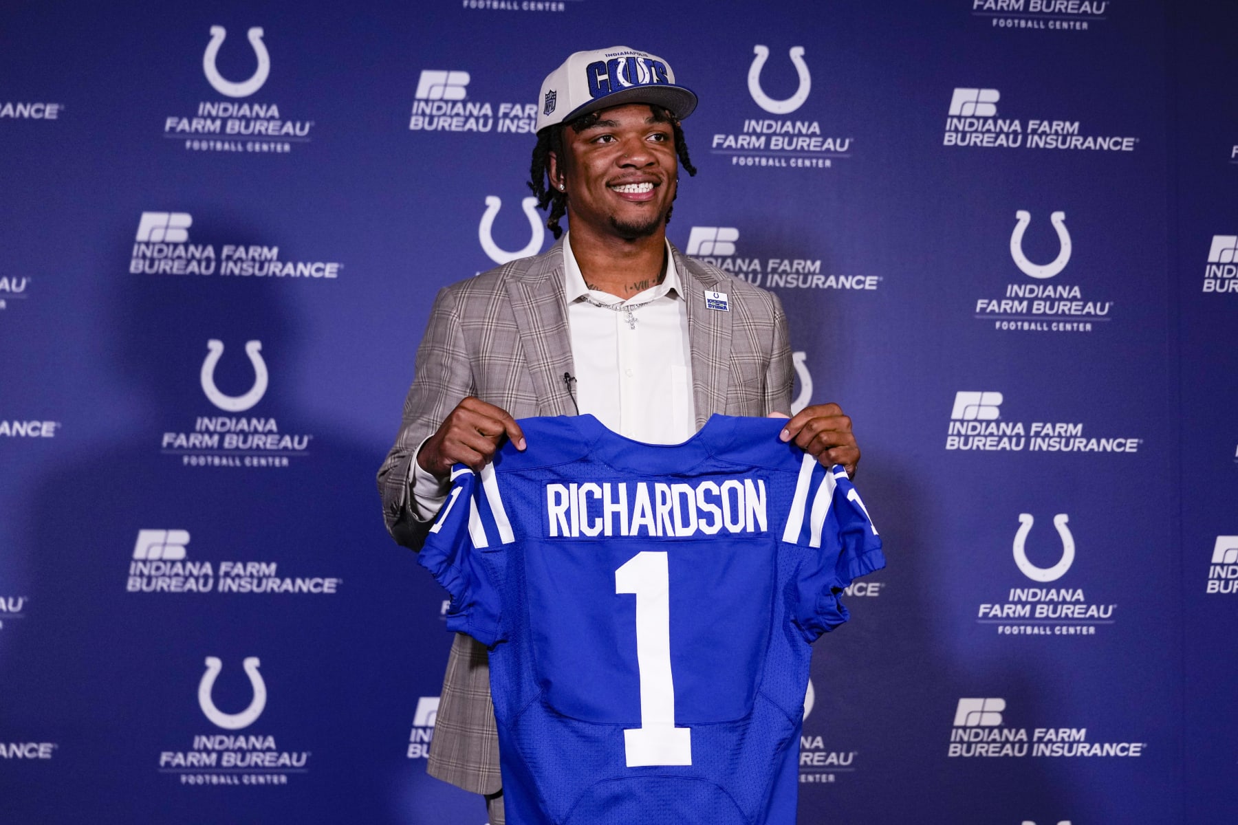 Indianapolis Colts first-round draft pick Anthony Richardson hold a Colts jersey following a news conference at the NFL football team's practice facility in Indianapolis, Friday, April 28, 2023. (AP Photo/Michael Conroy) Indianapolis Colts first-round draft pick Anthony Richardson hold a Colts jersey following a news conference at the NFL football team's practice facility in Indianapolis, Friday, April 28, 2023. (AP Photo/Michael Conroy)