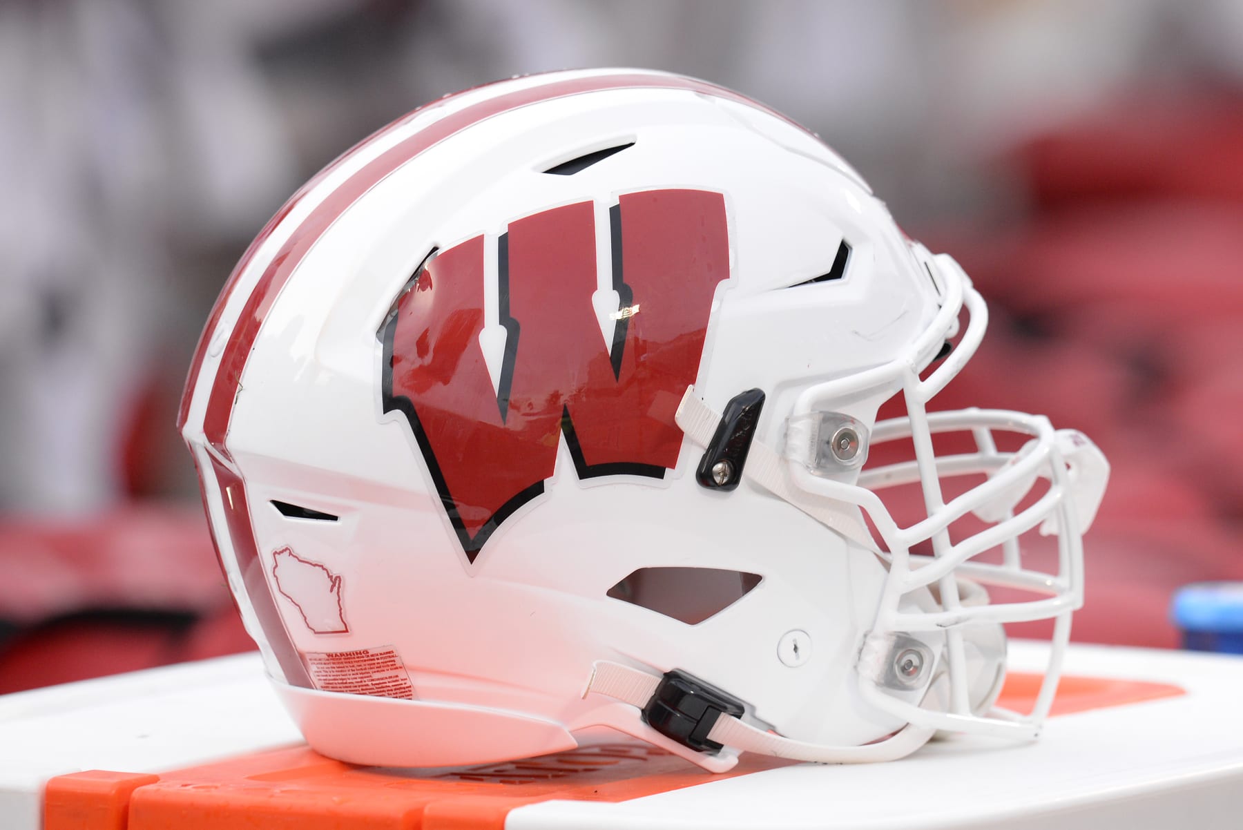 CHAMPAIGN, IL - OCTOBER 09: A Wisconsin Badgers helmet sits on the sidelines during the Big Ten conference college football game between the Wisconsin Badgers and the Illinois Fighting Illini on October 9, 2021, at Memorial Stadium in Champaign, Illinois. (Photo by Michael Allio/Icon Sportswire via Getty Images)