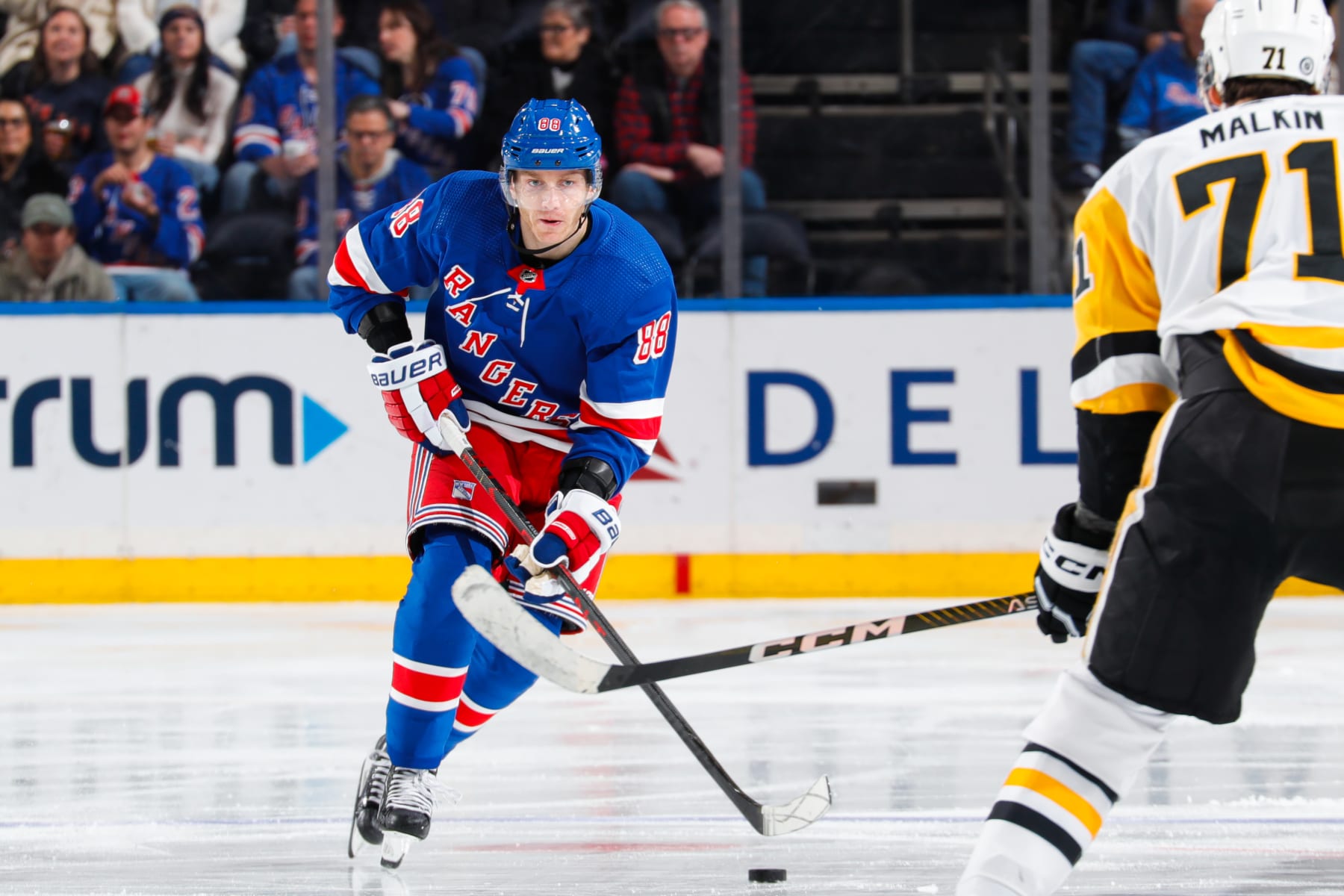 NEW YORK, NEW YORK - MARCH 18: Patrick Kane #88 of the New York Rangers skates with the puck against the Pittsburgh Penguins at Madison Square Garden on March 18, 2023 in New York City. (Photo by Jared Silber/NHLI via Getty Images)