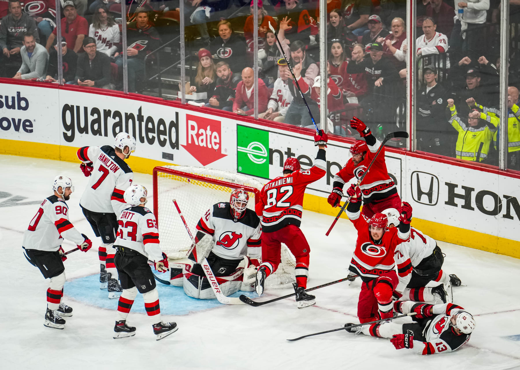 New Jersey Devils goaltender Akira Schmid (40) watches the puck against the  Carolina Hurricanes during the second period of Game 2 of an NHL hockey  Stanley Cup second-round playoff series in Raleigh