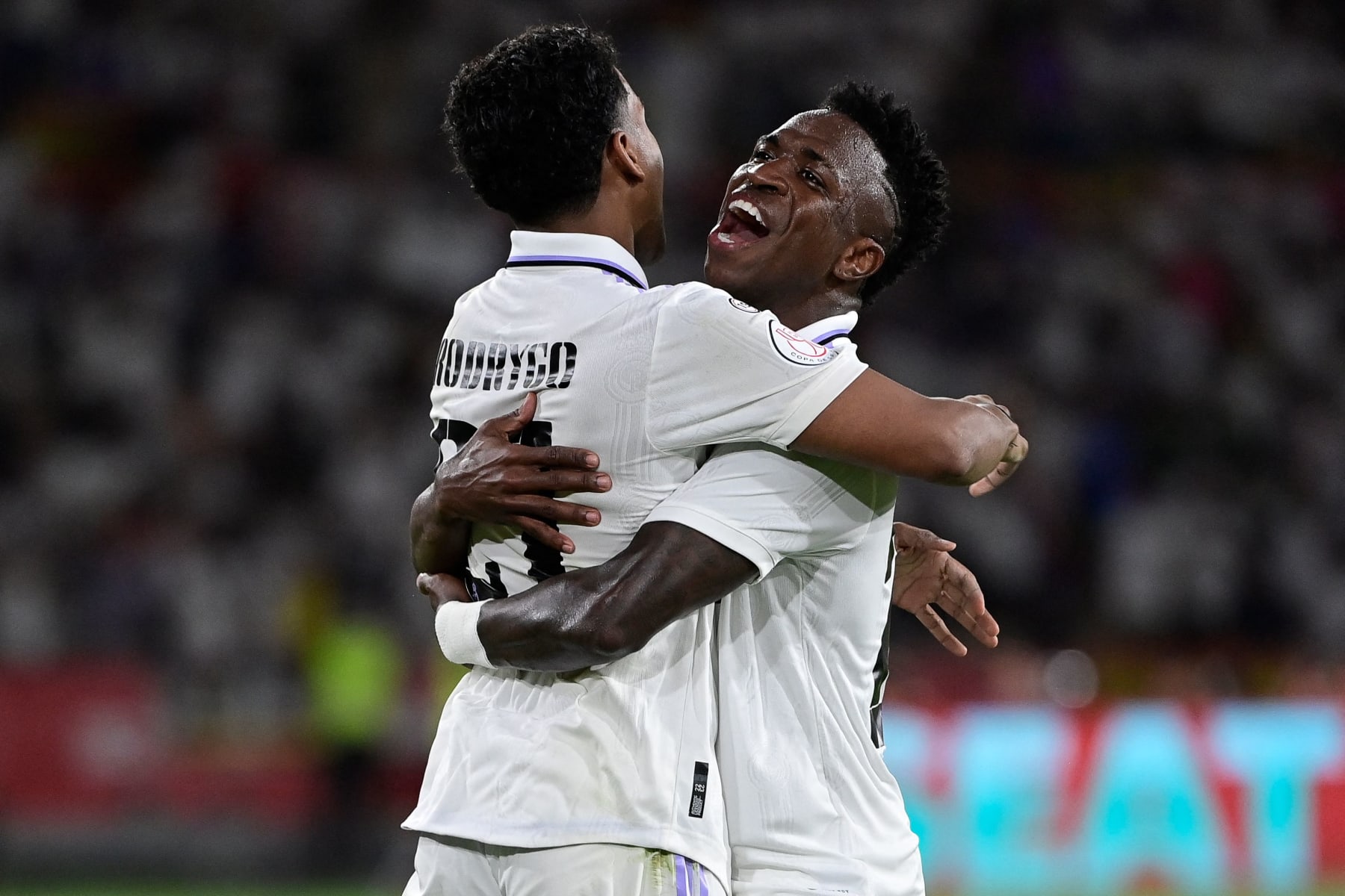 Real Madrid's Brazilian forward Rodrygo (L) celebrates with Real Madrid's Brazilian forward Vinicius Junior after scoring his team's second goal during the Spanish Copa del Rey (King's Cup) final football match between Real Madrid CF and CA Osasuna at La Cartuja stadium in Seville on May 6, 2023. (Photo by ANDER GILLENEA / AFP) (Photo by ANDER GILLENEA/AFP via Getty Images)