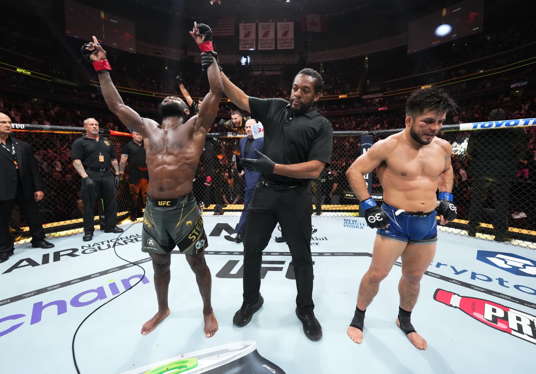 NEWARK, NEW JERSEY - MAY 06: Aljamain Sterling react after his victory over Henry Cejudo in the UFC bantamweight championship fight during the UFC 288 event at Prudential Center on May 06, 2023 in Newark, New Jersey. (Photo by Chris Unger/Zuffa LLC via Getty Images)