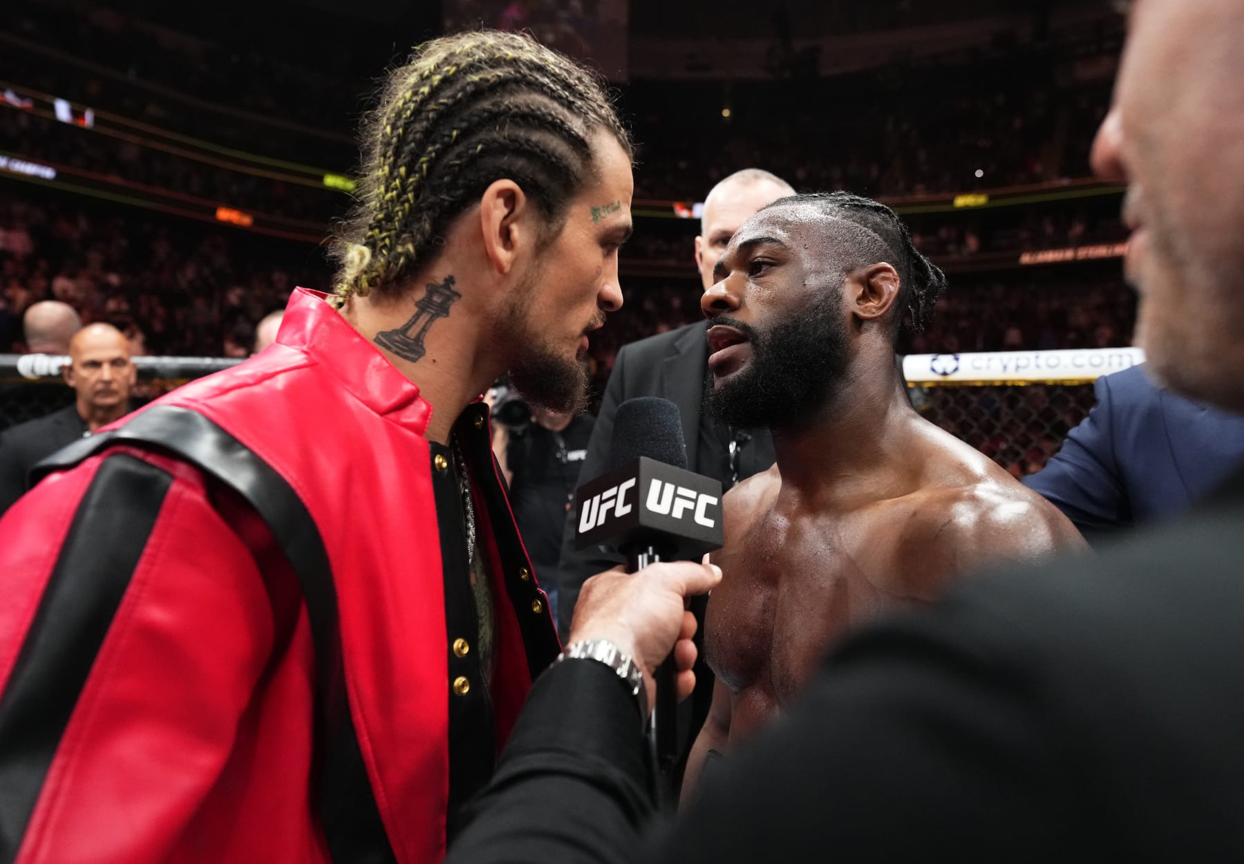 NEWARK, NEW JERSEY - MAY 06: (L-R) Sean O'Malley and Aljamain Sterling have words after Sterling's victory over Henry Cejudo in the UFC bantamweight championship fight during the UFC 288 event at Prudential Center on May 06, 2023 in Newark, New Jersey. (Photo by Chris Unger/Zuffa LLC via Getty Images)
