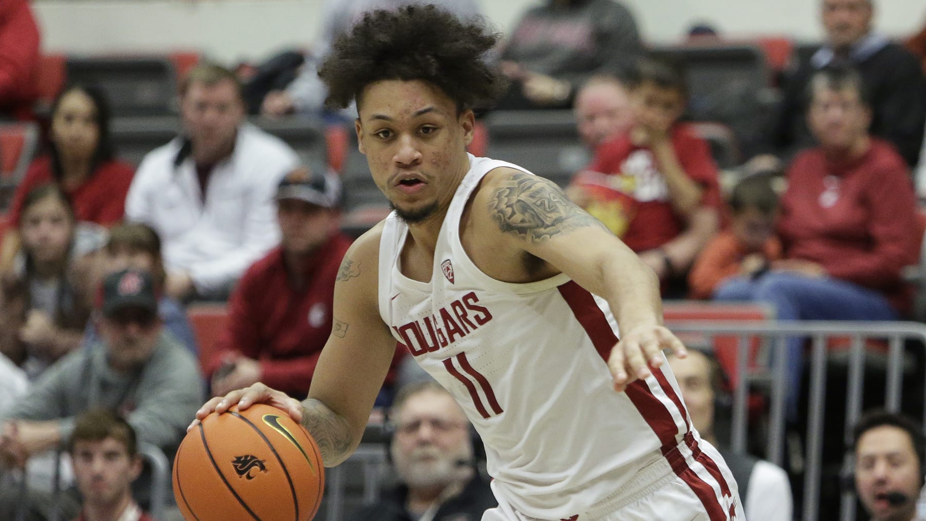 Washington State forward DJ Rodman drives during the second half of an NCAA college basketball game against Arizona State, Saturday, Jan. 28, 2023, in Pullman, Wash. (AP Photo/Young Kwak)