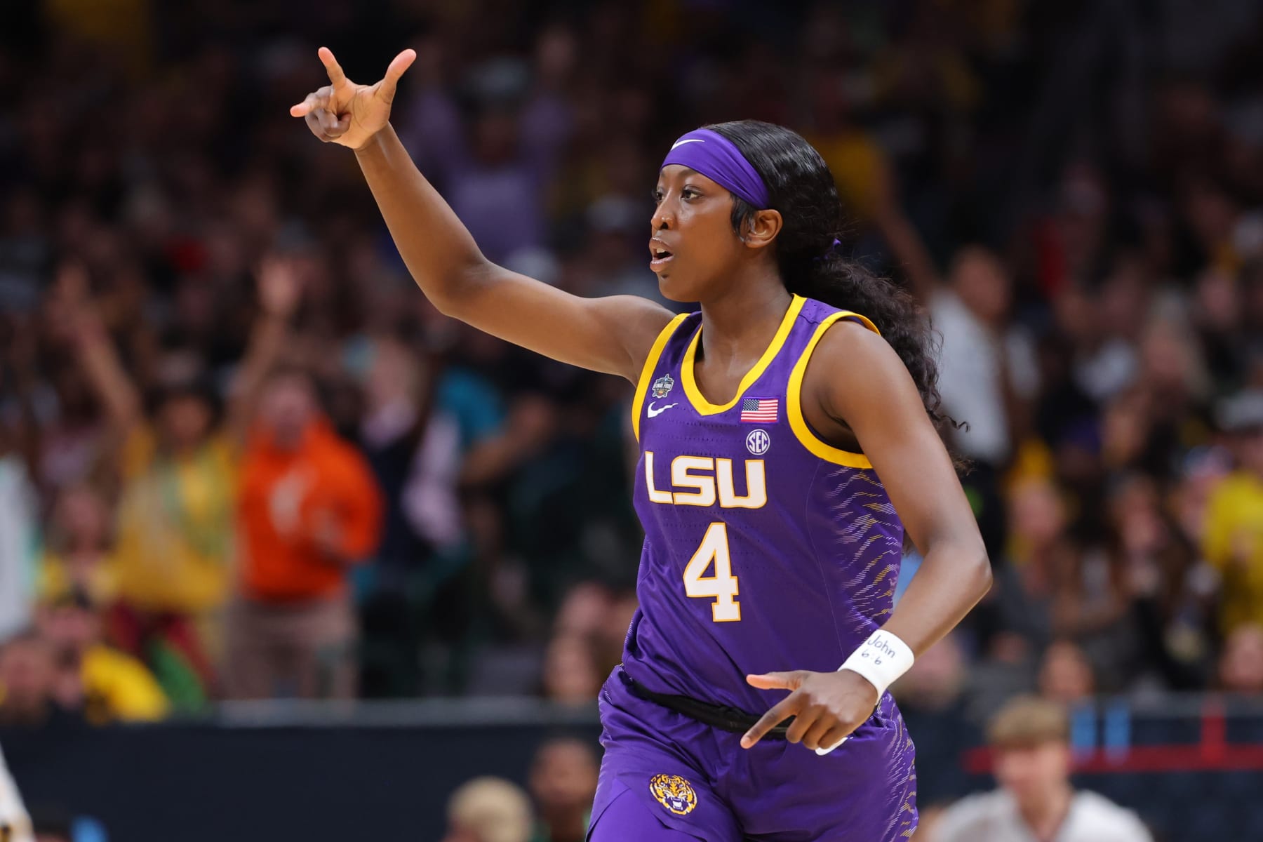 DALLAS, TX - APRIL 02: Flaujae Johnson #4 of the Louisiana State Tigers celebrates a play against the Iowa Hawkeyes during the 2023 NCAA Women's Basketball Tournament National Championship at American Airlines Center on April 2, 2023 in Dallas, Texas. (Photo by C. Morgan Engel/NCAA Photos via Getty Images)