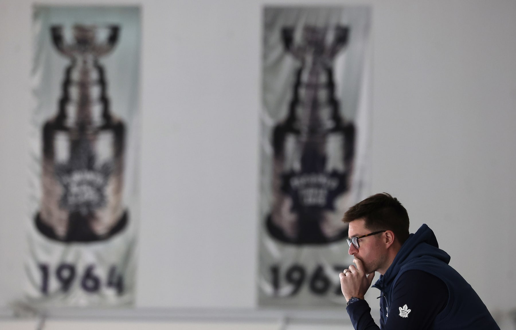 TORONTO, ON- MAY 3 - Kyle Dubas watches as the Toronto Maple Leafs practice between games 1 and 2 for their second round of the NHL Stanley Cup playoffs series against the Florida Panthers at Ford Performance Centre in Toronto. May 3, 2023. (Steve Russell/Toronto Star via Getty Images)