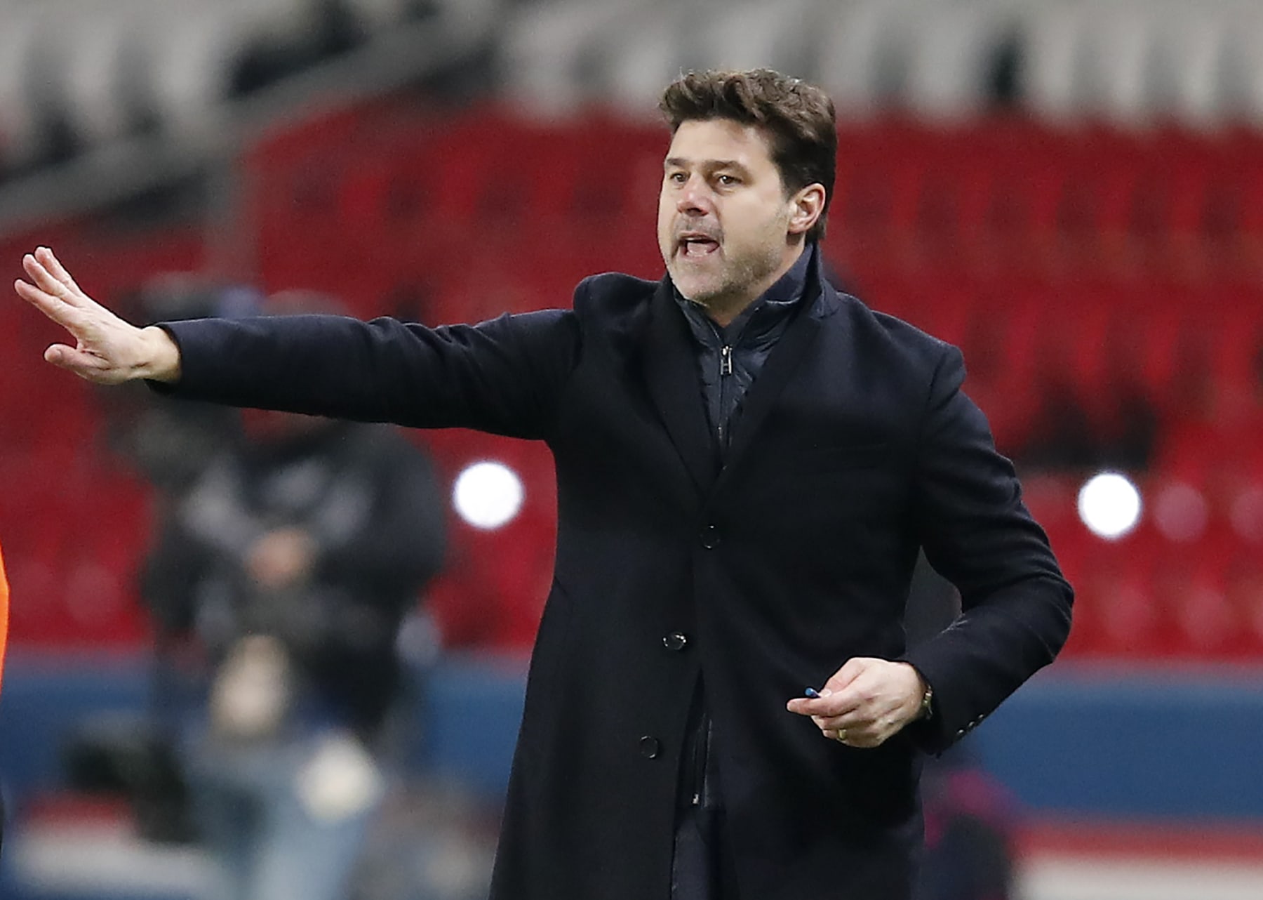 PSG's head coach Mauricio Pochettino gestures from the touchline during the French League One soccer match between Paris Saint-Germain and Brest at the Parc des Princes in Paris, Saturday, Jan. 9, 2021. (AP Photo/Francois Mori)