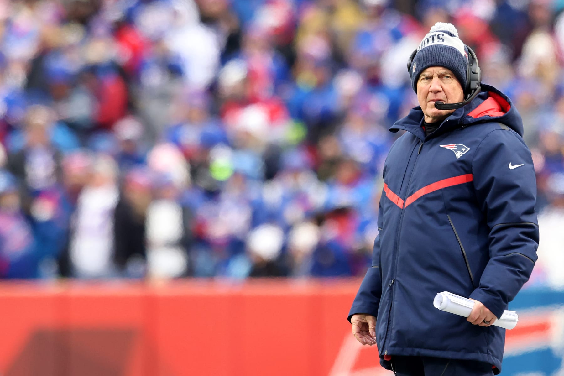 ORCHARD PARK, NEW YORK - JANUARY 08: Head Coach Bill Belichick of the New England Patriots looks on during the second quarter against the Buffalo Bills at Highmark Stadium on January 08, 2023 in Orchard Park, New York. (Photo by Bryan Bennett/Getty Images) ORCHARD PARK, NEW YORK - JANUARY 08: Head Coach Bill Belichick of the New England Patriots looks on during the second quarter against the Buffalo Bills at Highmark Stadium on January 08, 2023 in Orchard Park, New York. (Photo by Bryan Bennett/Getty Images)