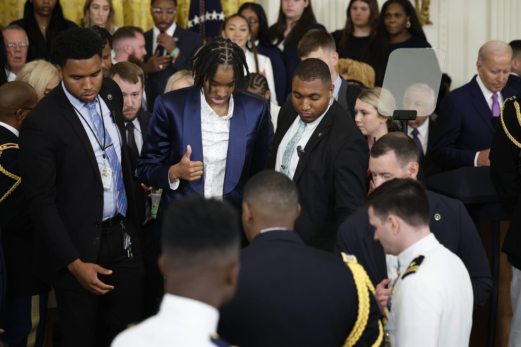 WASHINGTON, DC - MAY 26:  Louisiana State University team member Sa'Myah Smith flashes a thumbs-up after collapsing during a celebration of the team's NCAA Division I women's basketball national championship in the East Room of the White House on May 26, 2023 in Washington, DC. LSU head coach Kim Mulkey later said the Smith was fine after passing out on stage during the celebration. (Photo by Chip Somodevilla/Getty Images)
